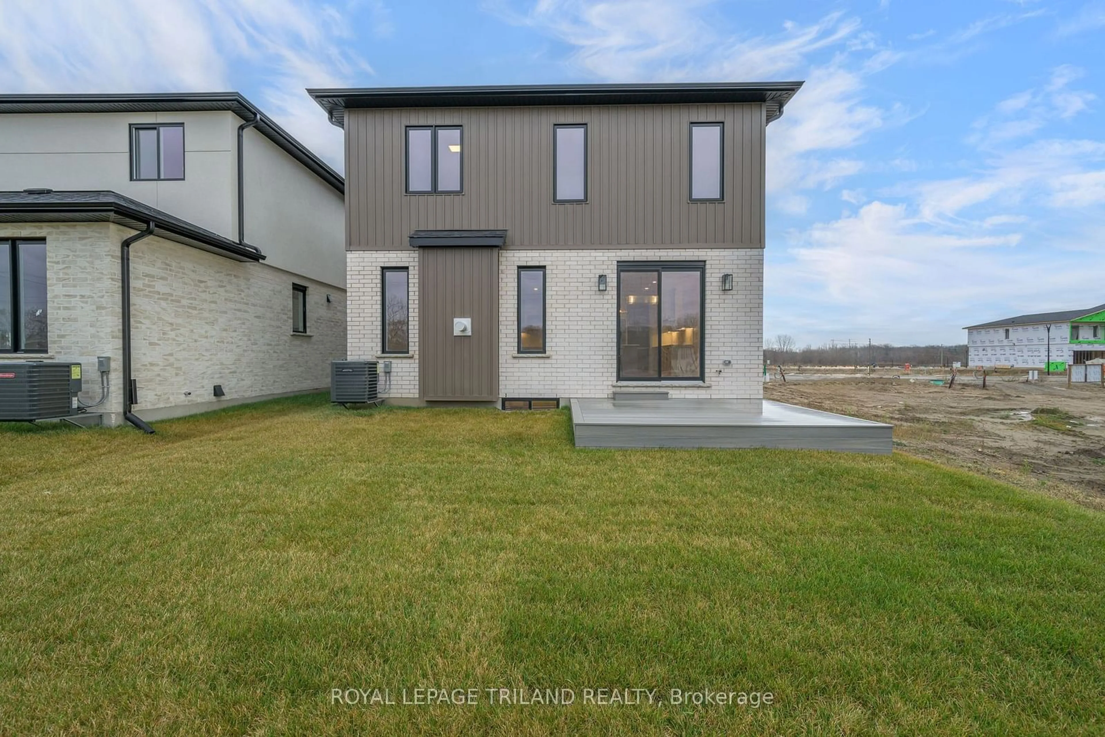 Frontside or backside of a home, the fenced backyard for 4211 Liberty Crossing, London Ontario N6P 0L1