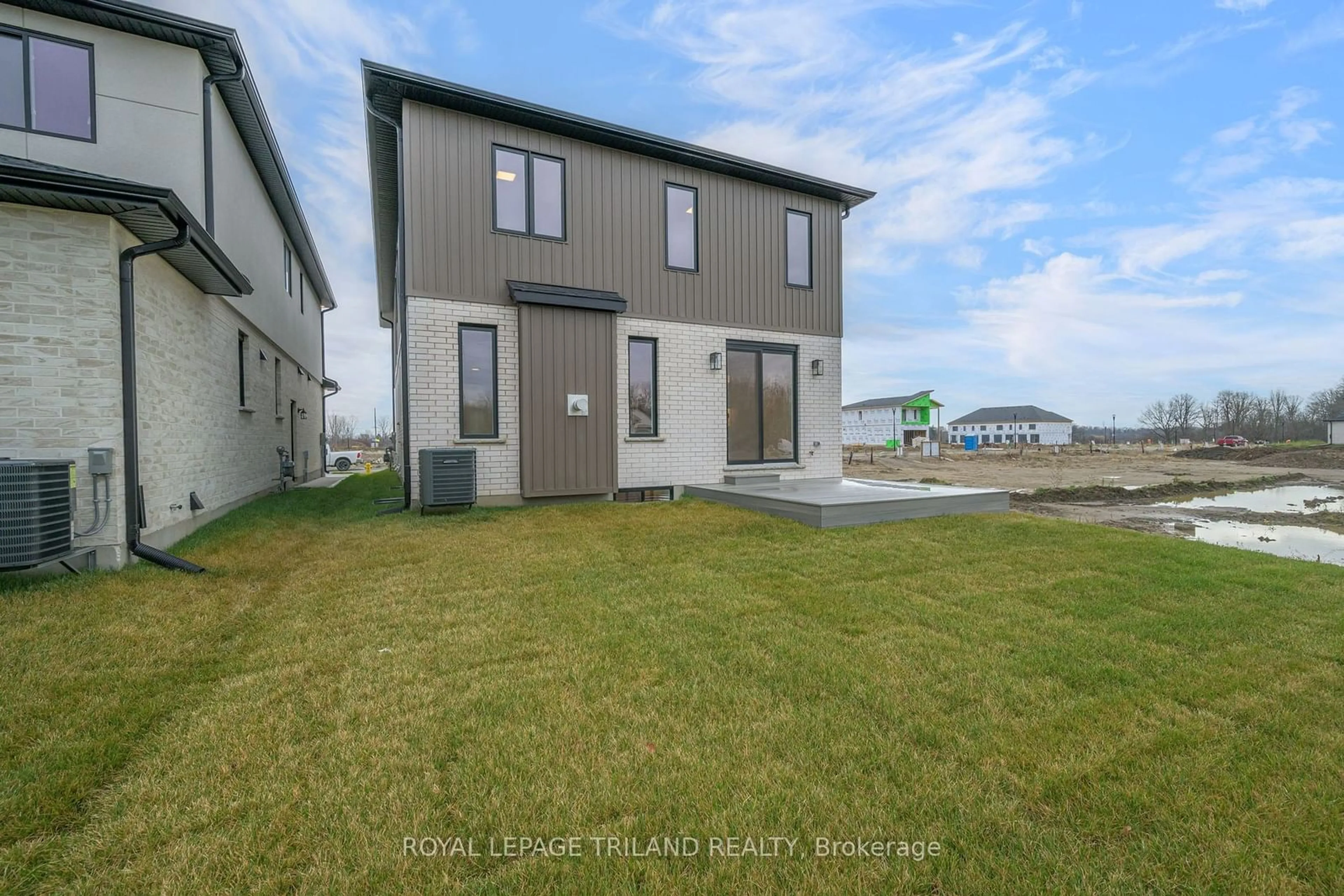 Frontside or backside of a home, the fenced backyard for 4211 Liberty Crossing, London Ontario N6P 0L1