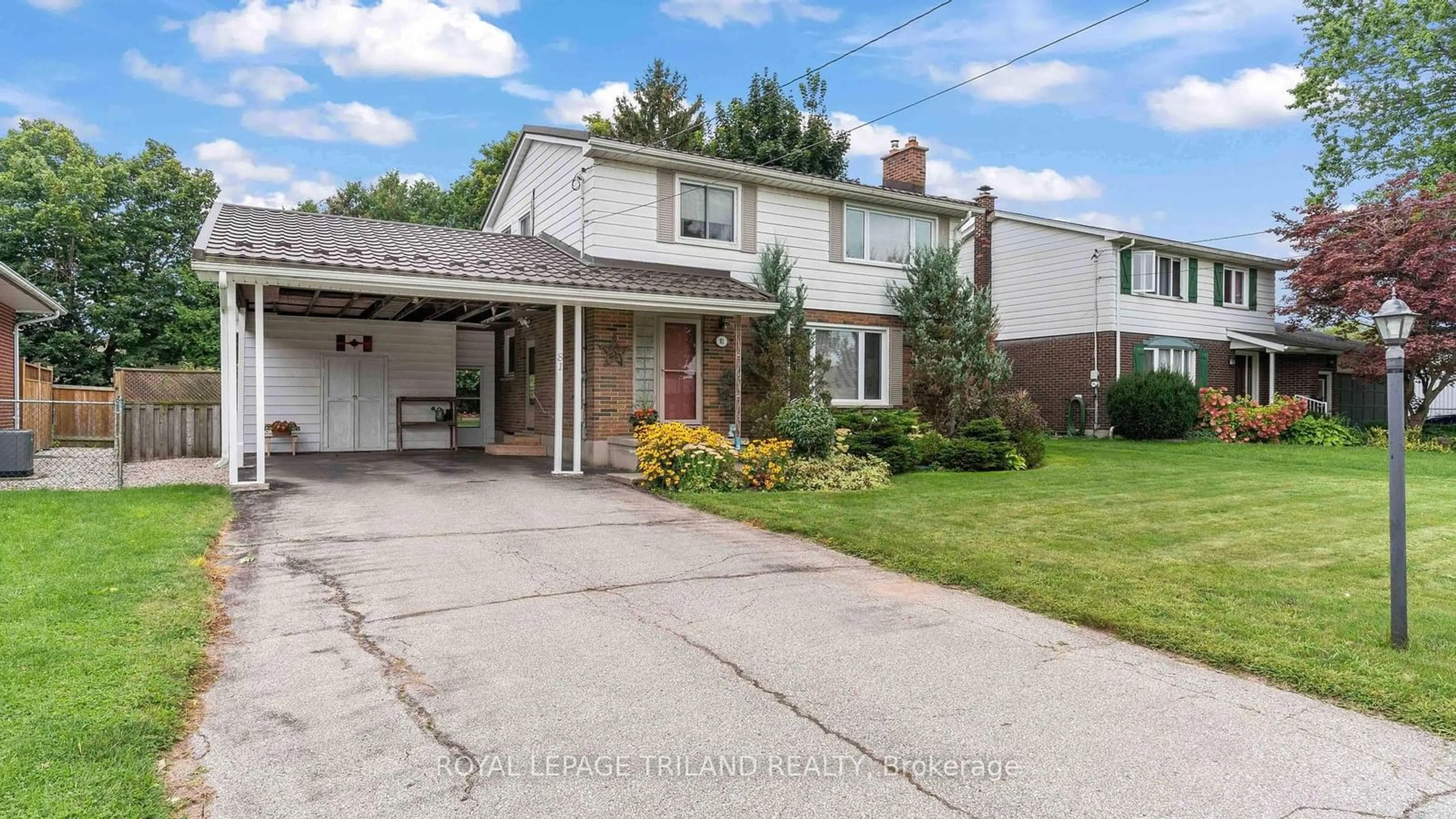 Frontside or backside of a home, the street view for 81 QUEEN St, Thames Centre Ontario N0L 1G2