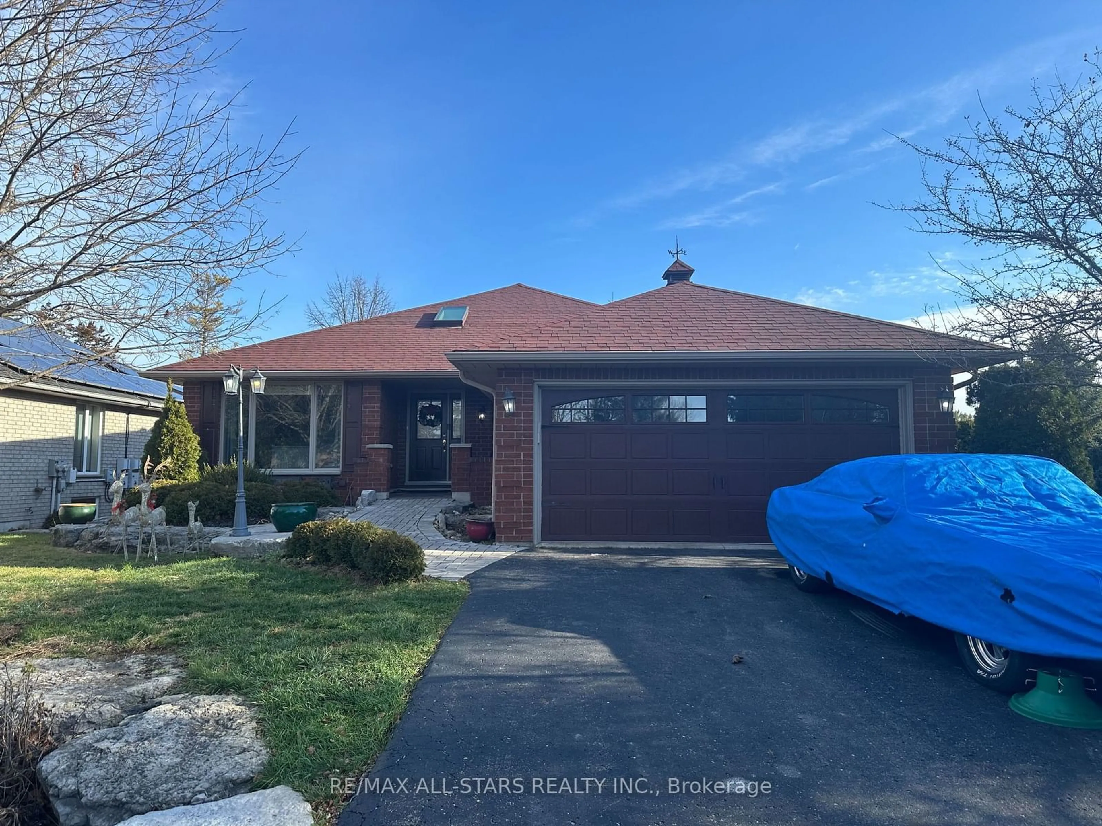 Frontside or backside of a home, the street view for 22 Ports Dr, Kawartha Lakes Ontario K0M 1A0