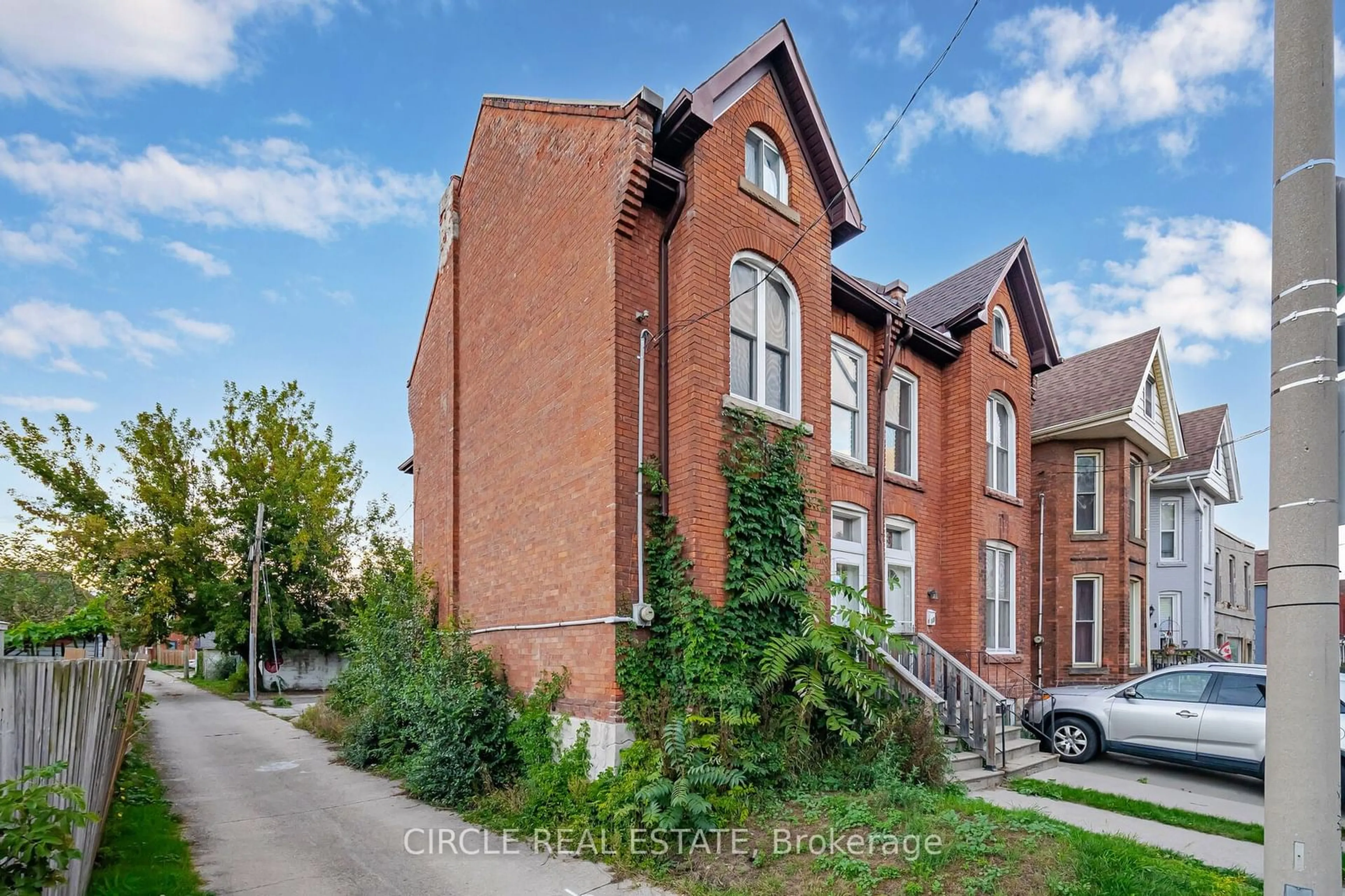 Home with brick exterior material, street for 31 Wentworth St, Hamilton Ontario L8L 5V2