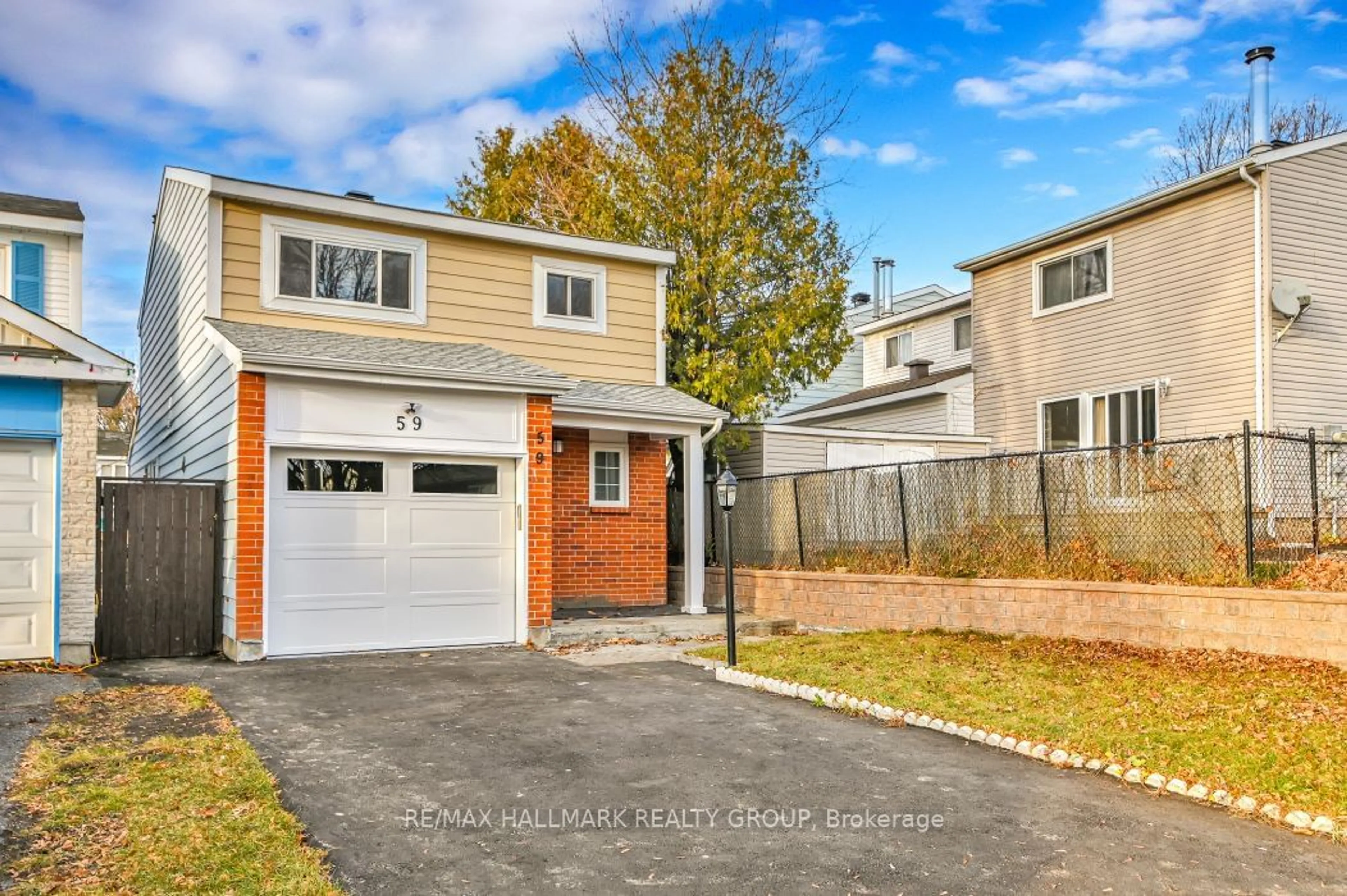 Frontside or backside of a home, the fenced backyard for 59 WESSEX Rd #31, Barrhaven Ontario K2J 1X3