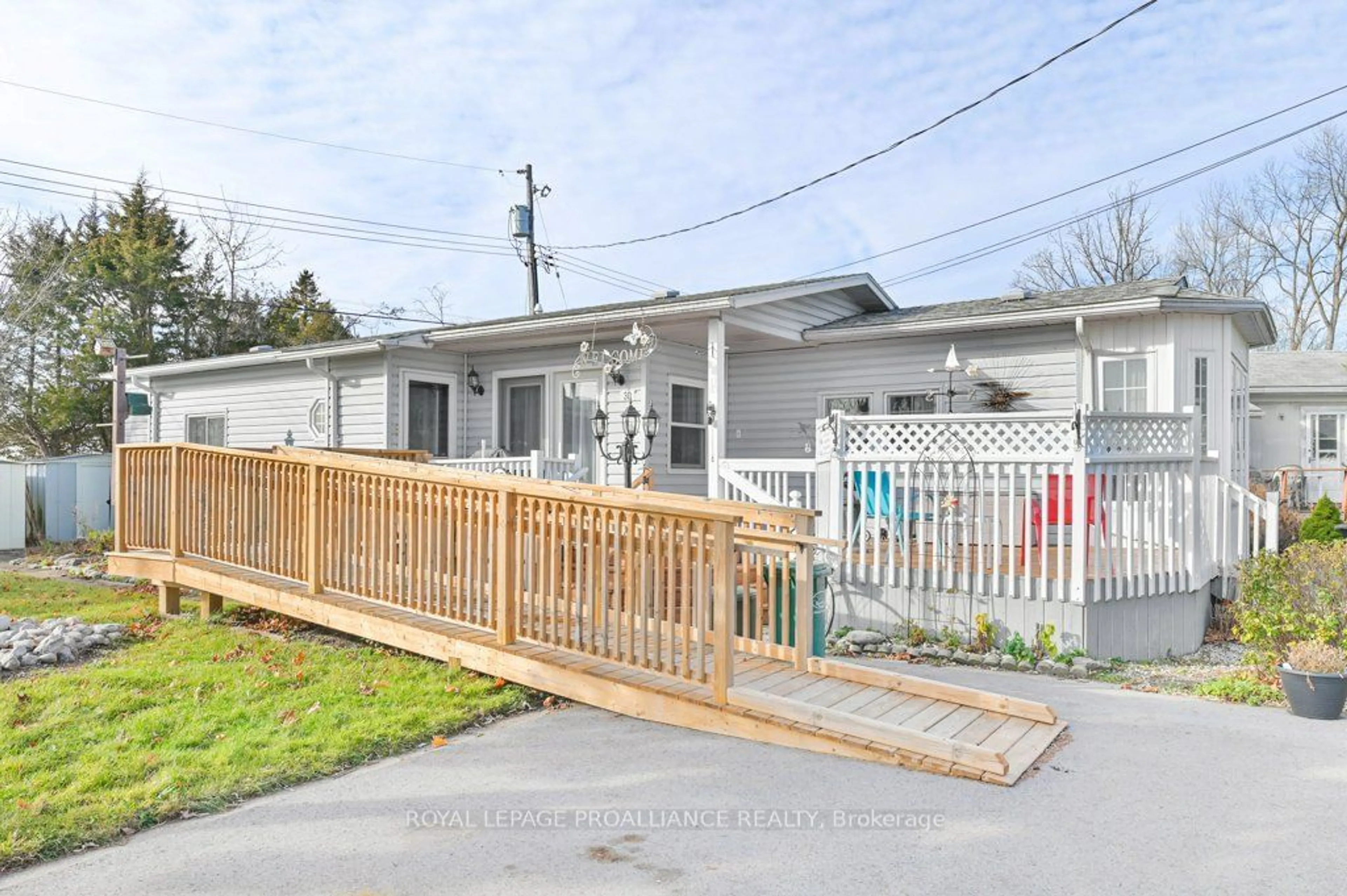 Frontside or backside of a home, the fenced backyard for 30 Kenneth Blvd, Quinte West Ontario K8N 4Z3