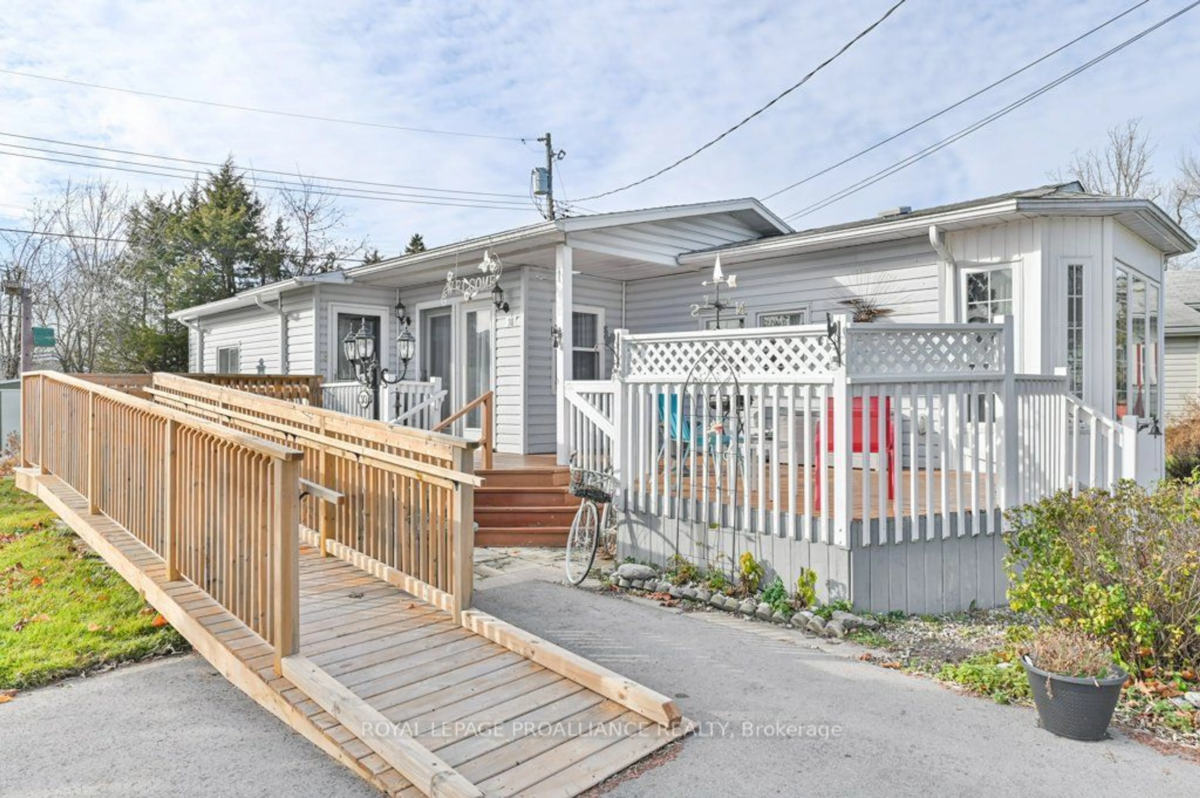 Frontside or backside of a home, the fenced backyard for 30 Kenneth Blvd, Quinte West Ontario K8N 4Z3