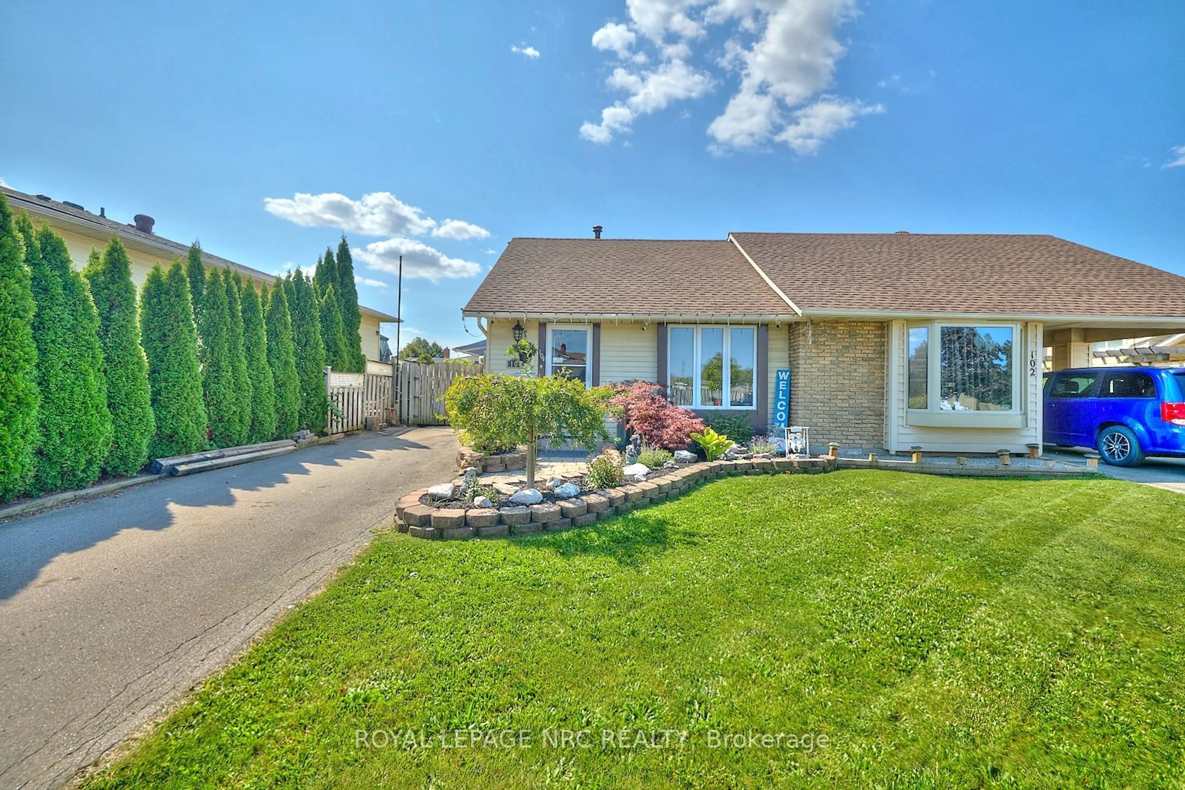 A pic from exterior of the house or condo, the fenced backyard for 104 Carriage Rd, St. Catharines Ontario L2P 3S8