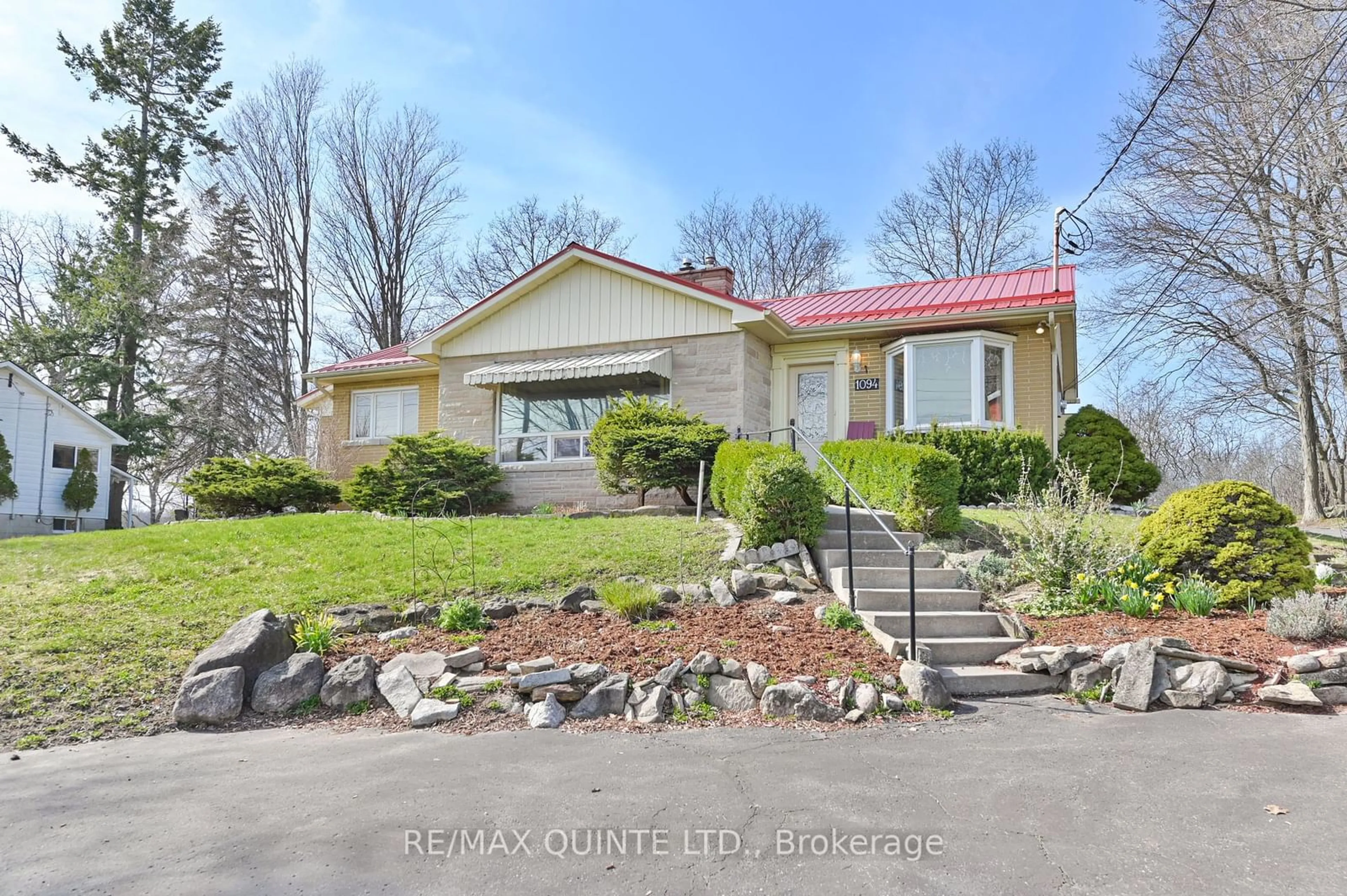 Frontside or backside of a home, the street view for 1094 Highway 2, Kingston Ontario K7L 4V1