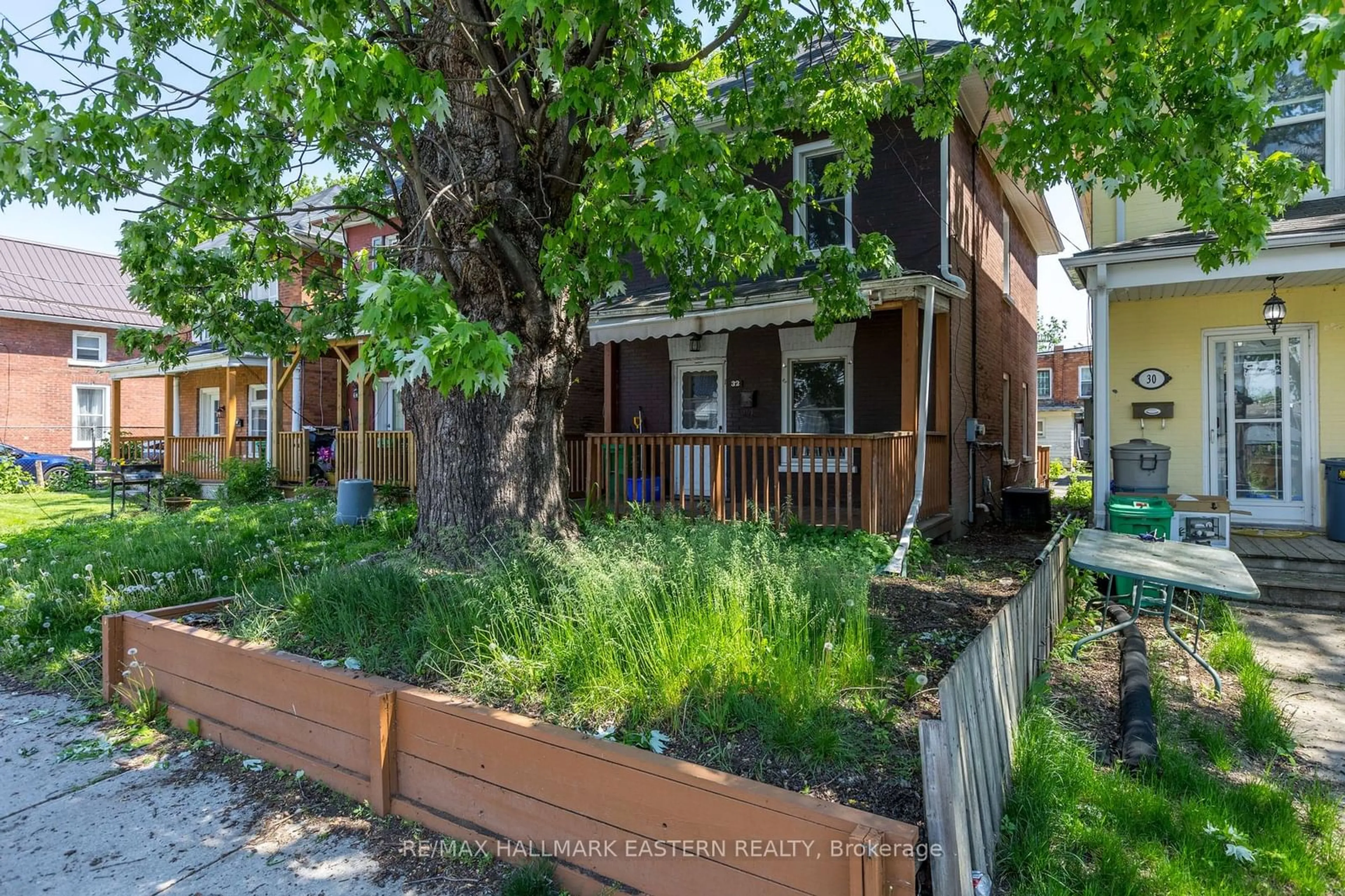 Frontside or backside of a home, the fenced backyard for 32 Lafayette Ave, Peterborough Ontario K9J 5C2