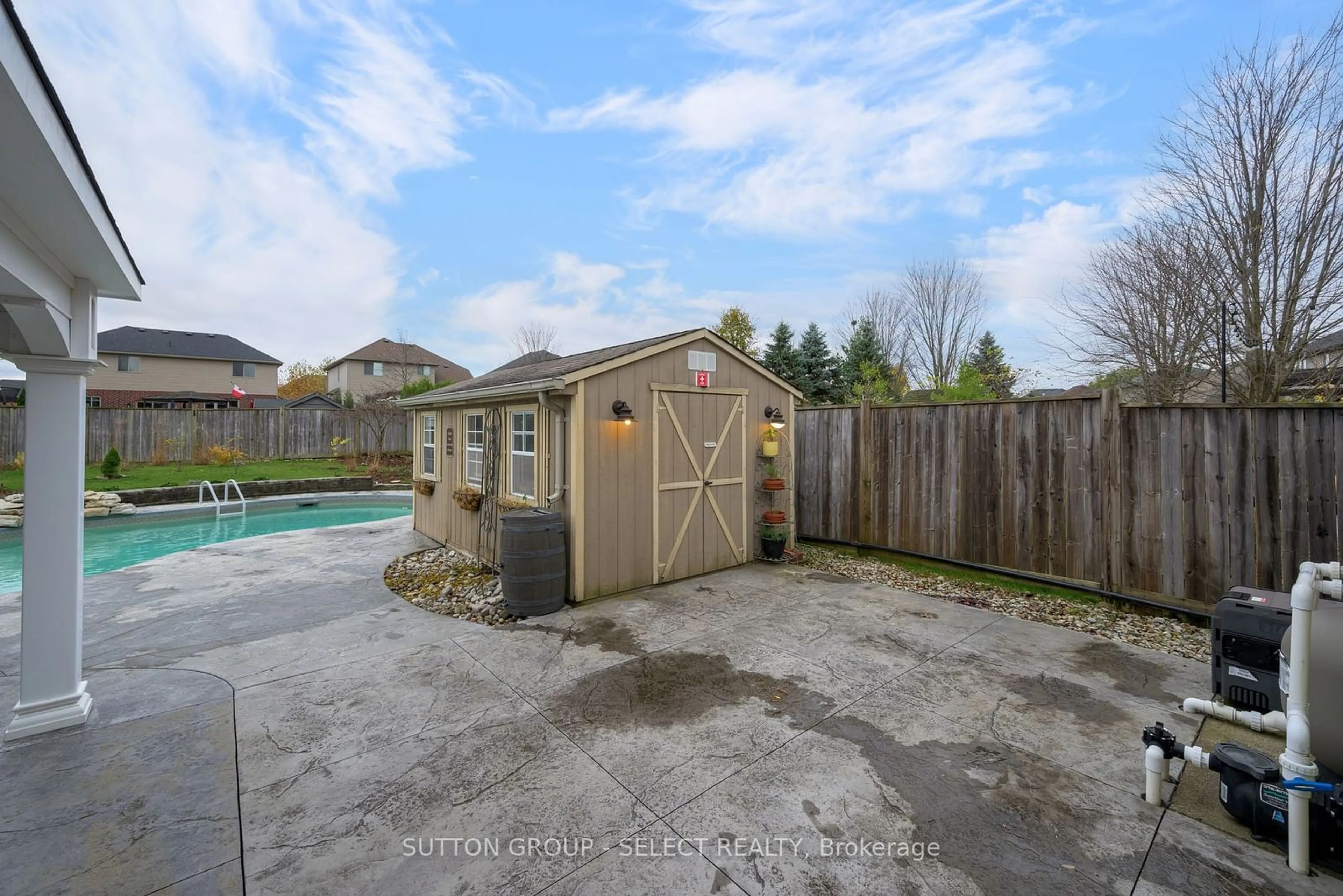 Frontside or backside of a home, the fenced backyard for 305 Skyline Ave, London Ontario N5X 0A5