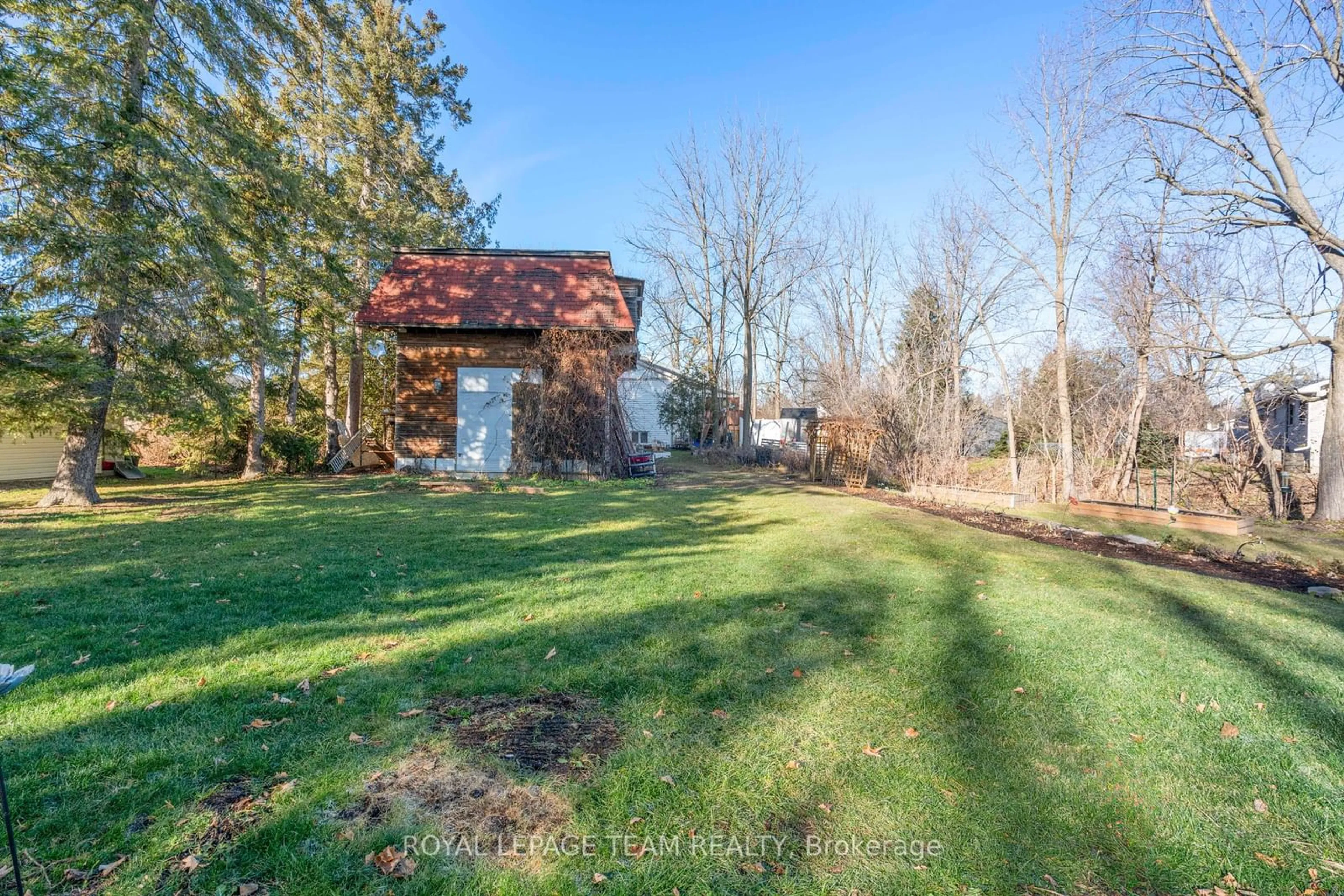 A pic from exterior of the house or condo, the fenced backyard for 77 Queen St, North Dundas Ontario K0C 1H0