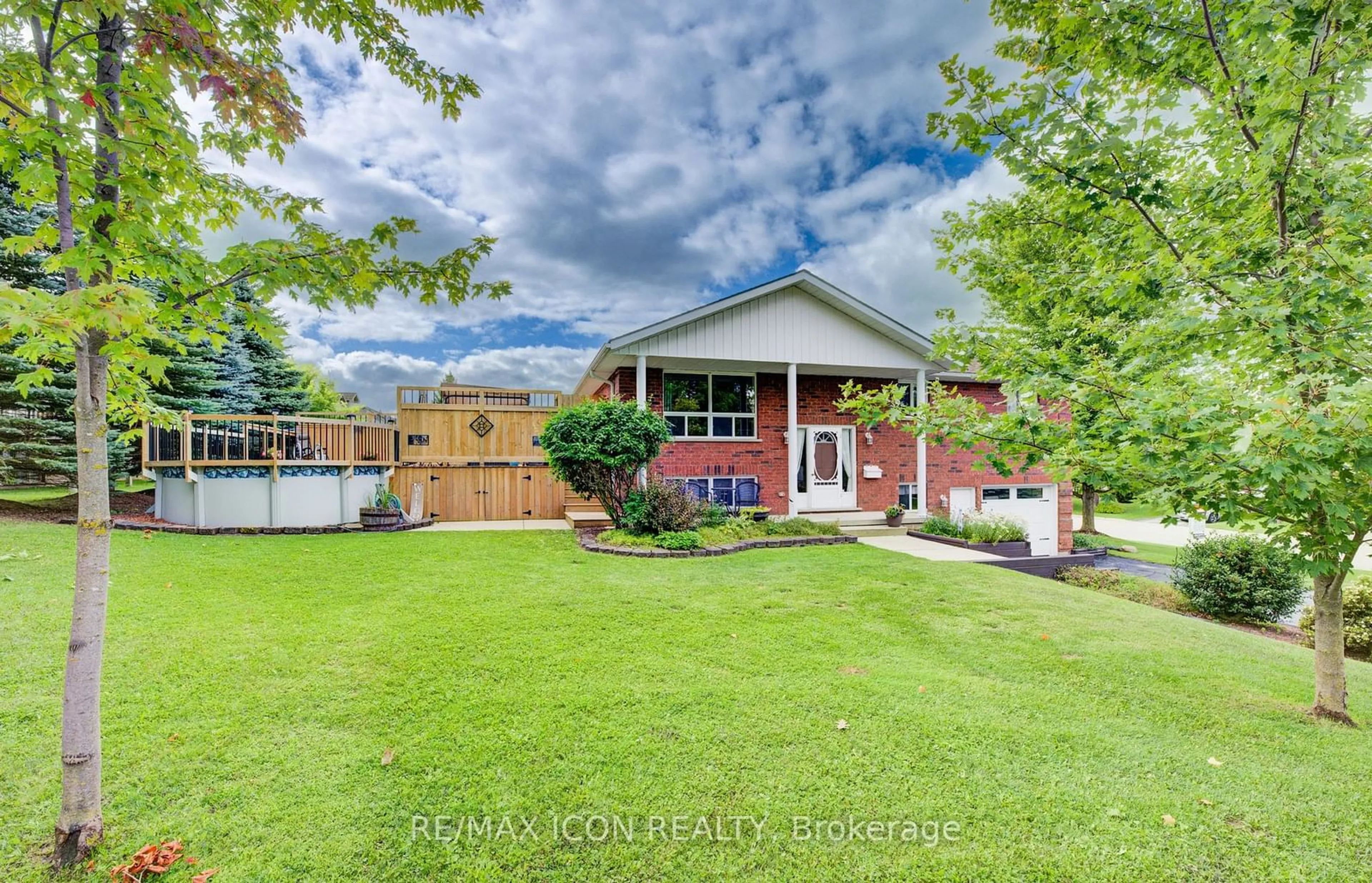 Frontside or backside of a home, the fenced backyard for 178 Melissa Cres, Wellington North Ontario N0G 2L3