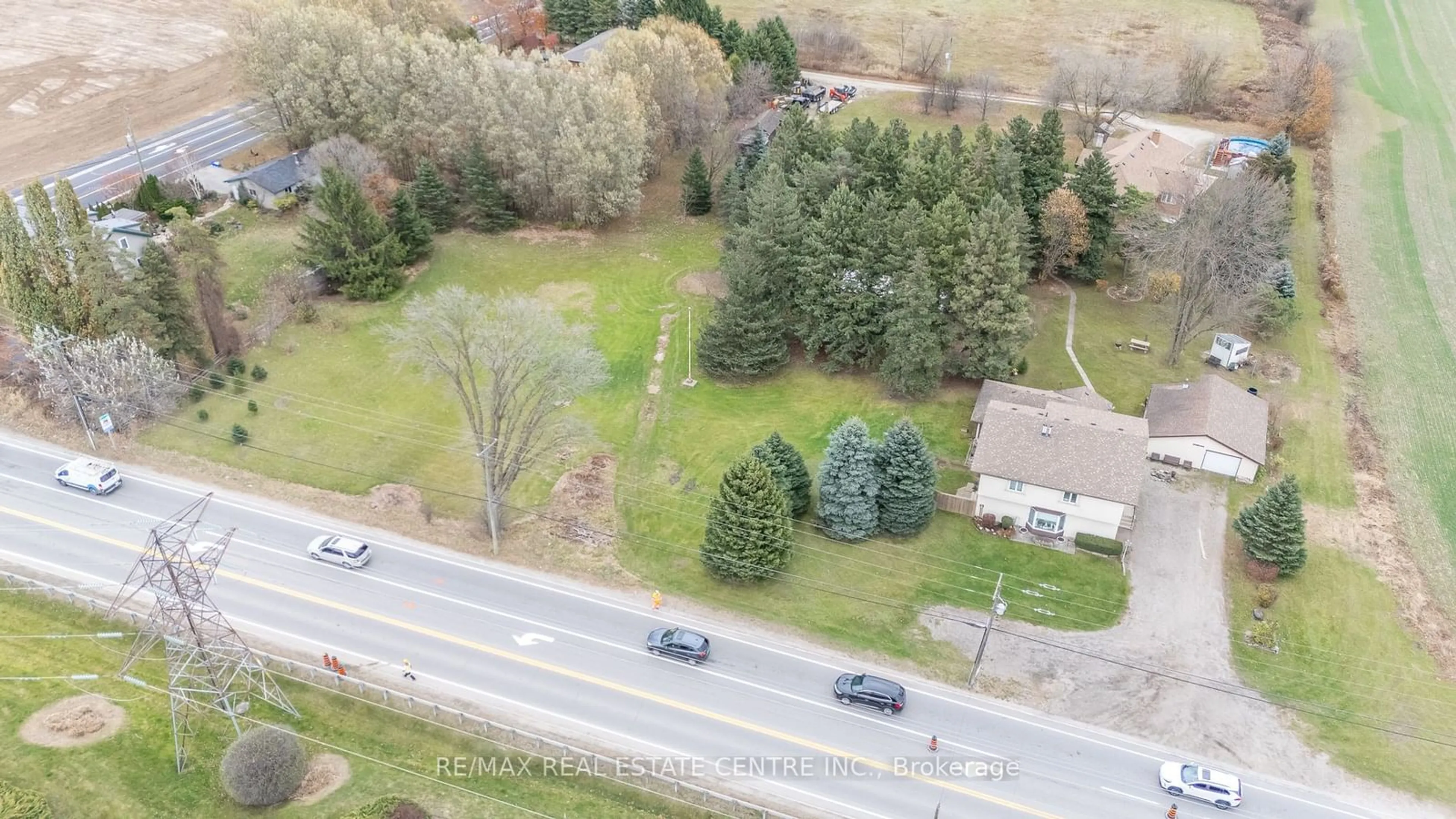 A pic from exterior of the house or condo, the street view for 7147 Wellington Road 124 Rd, Guelph/Eramosa Ontario N1H 6J3