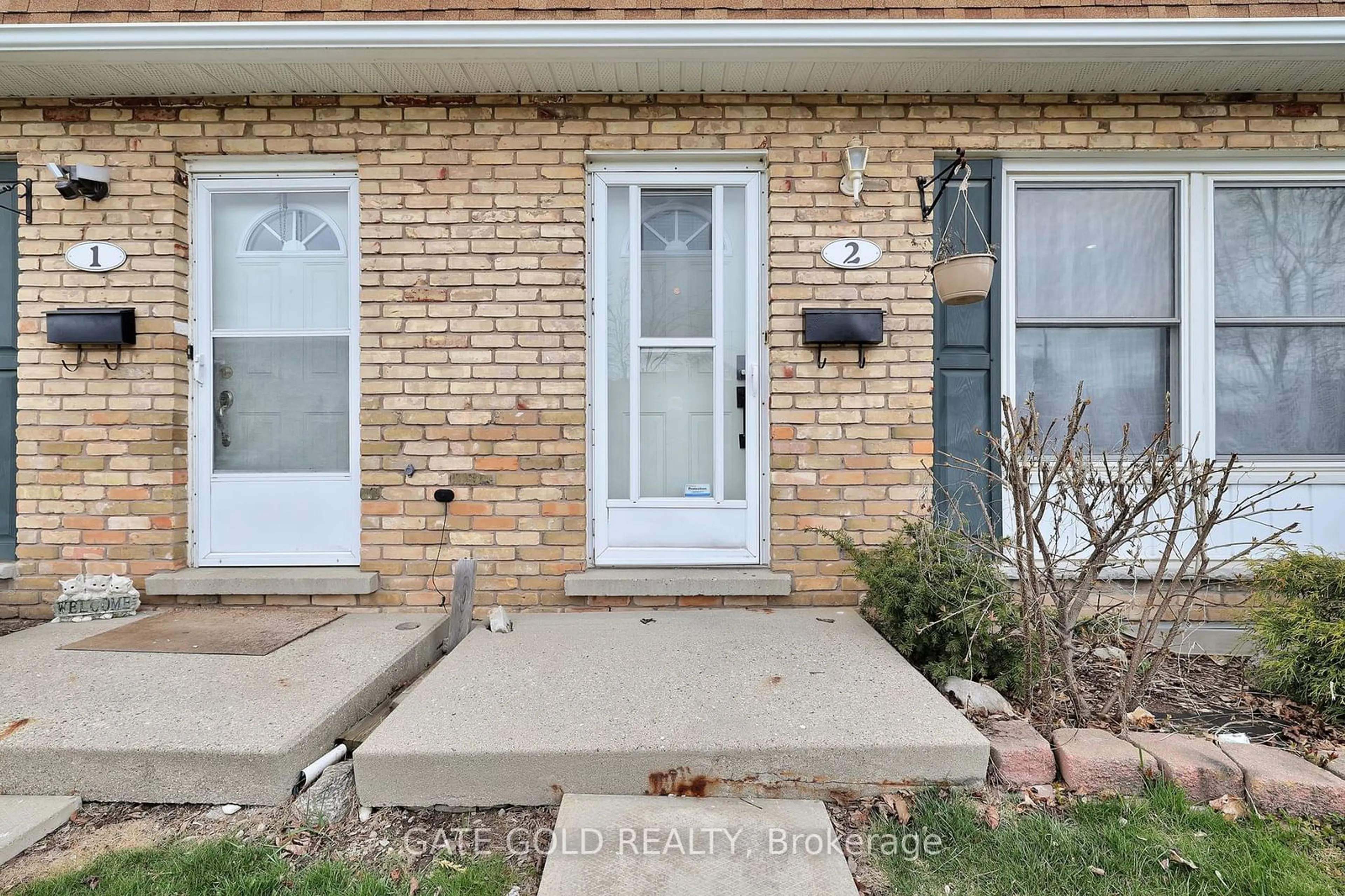 A pic from exterior of the house or condo, the street view for 596 Grey St #2, Brantford Ontario N3S 4Y1