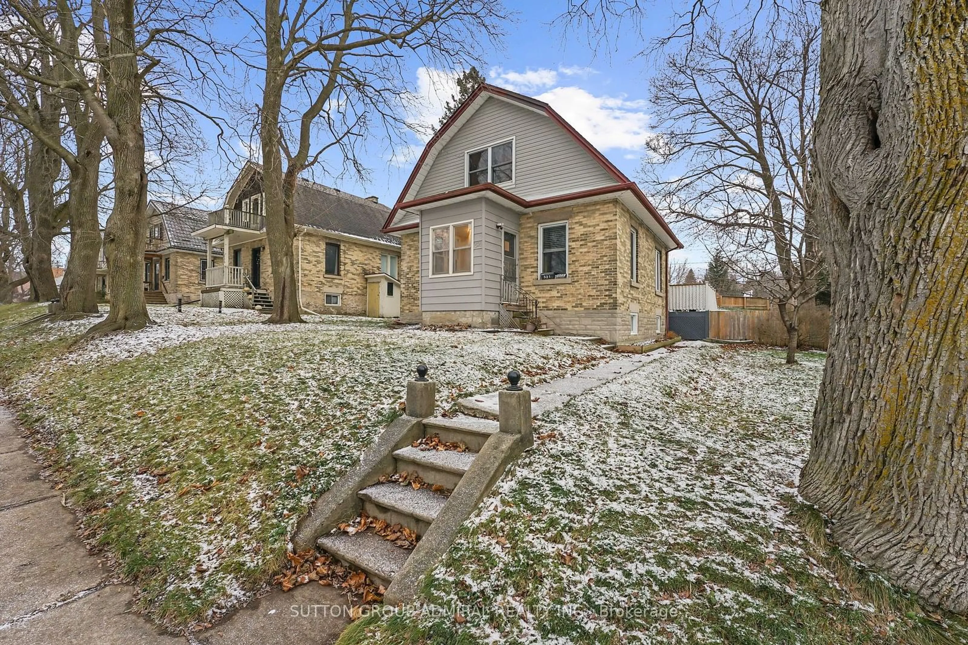 A pic from exterior of the house or condo, the fenced backyard for 521 St Andrew St, Centre Wellington Ontario N1M 1P4