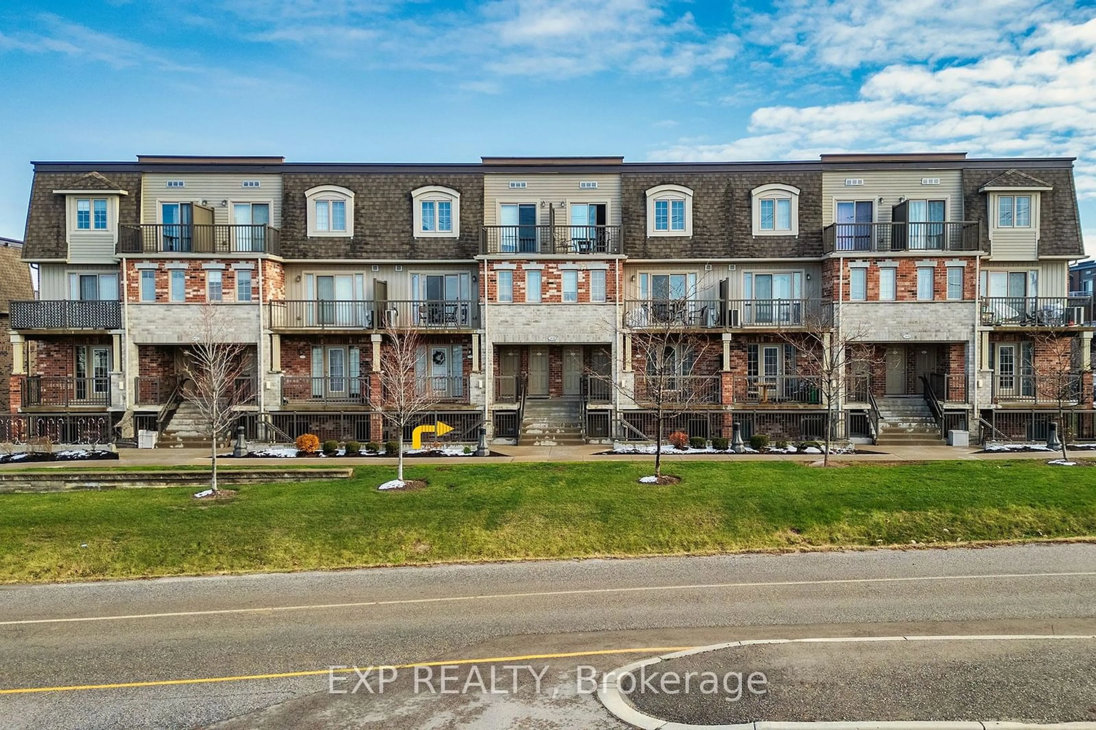 A pic from exterior of the house or condo, the street view for 1674 Fischer Hallman Rd #G, Kitchener Ontario N2R 0H9