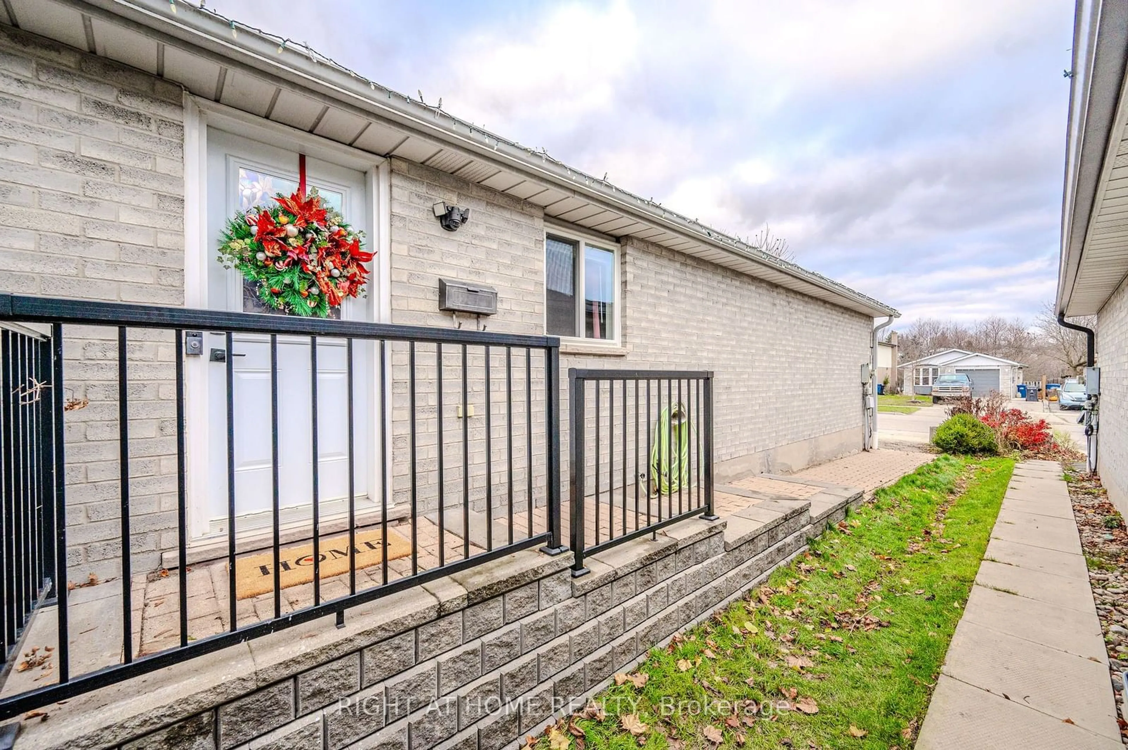 A pic from exterior of the house or condo, the fenced backyard for 300 Auden Rd, Guelph Ontario N1E 6S3