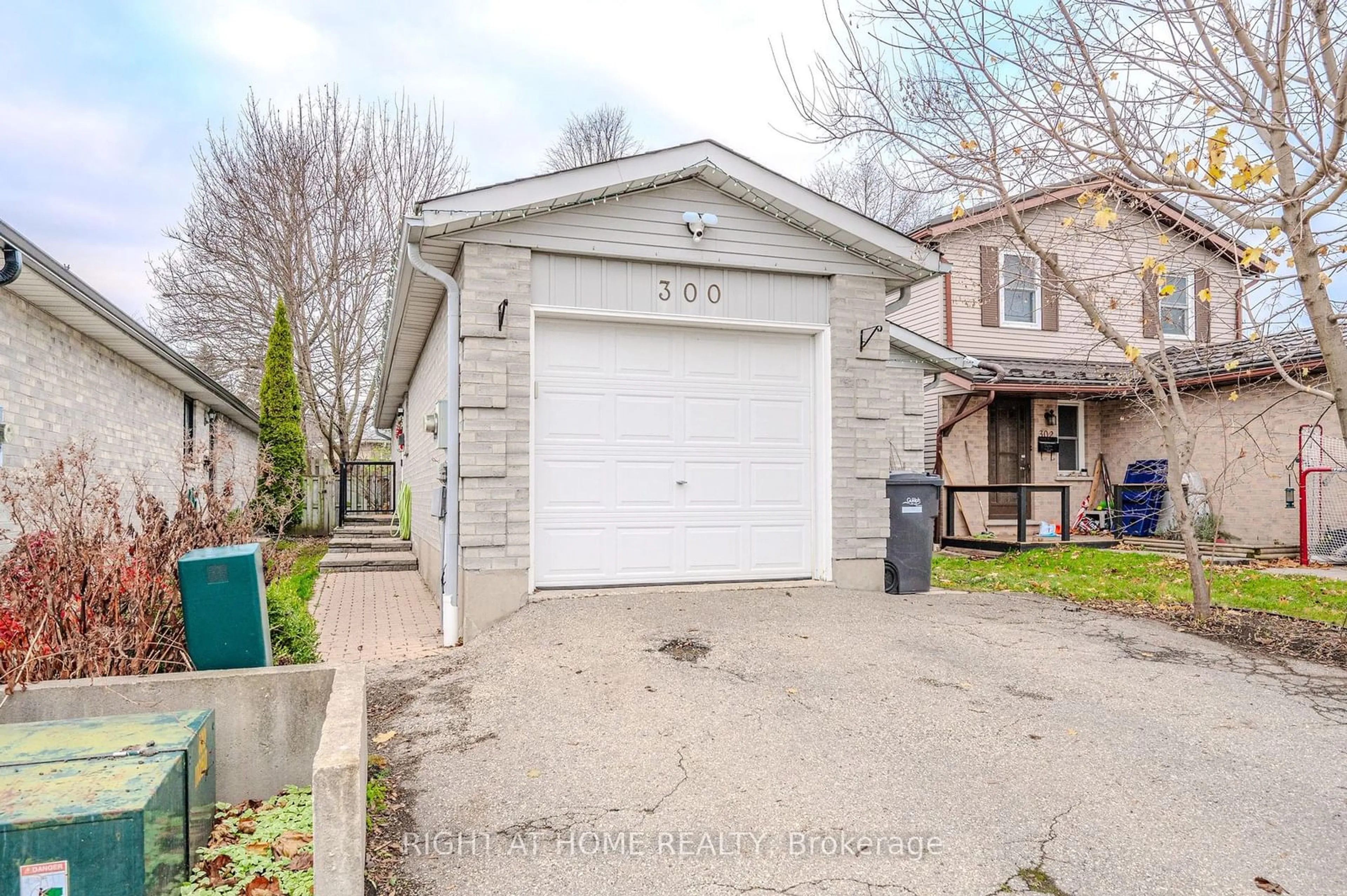 Frontside or backside of a home, the street view for 300 Auden Rd, Guelph Ontario N1E 6S3