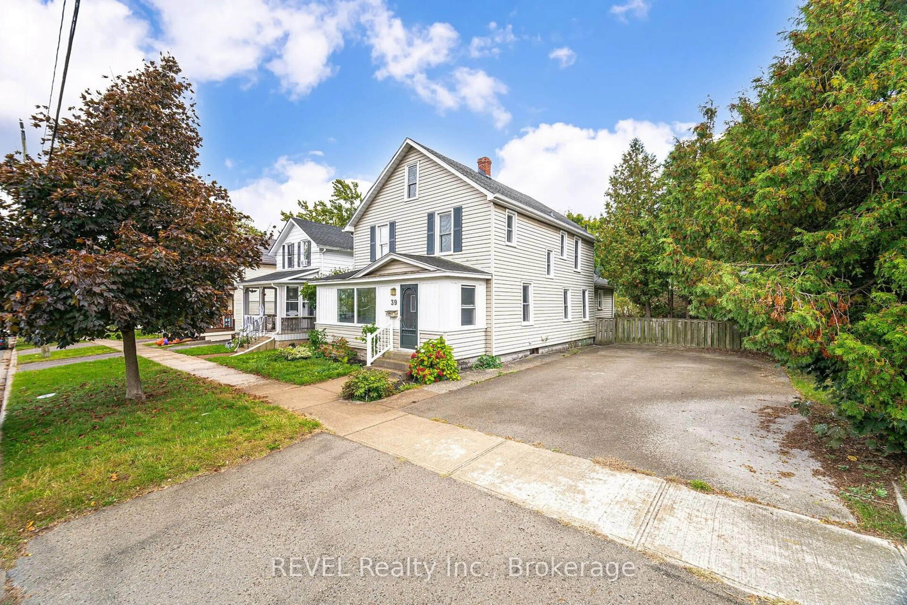 Frontside or backside of a home, the fenced backyard for 39 Phipps St, Fort Erie Ontario L2A 2V3