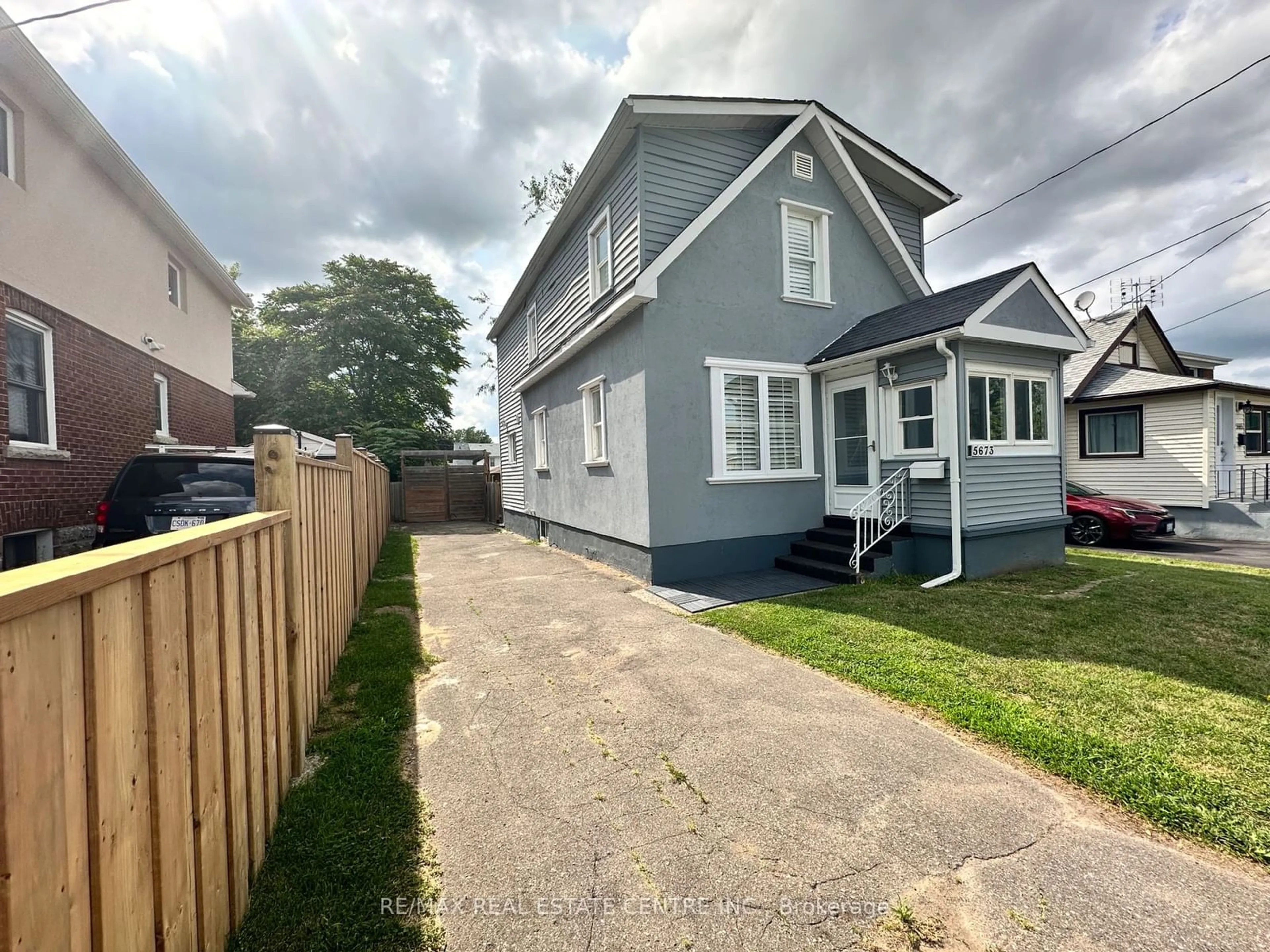 Frontside or backside of a home, the fenced backyard for 5673 Glenholme Ave, Niagara Falls Ontario L2G 4Y5