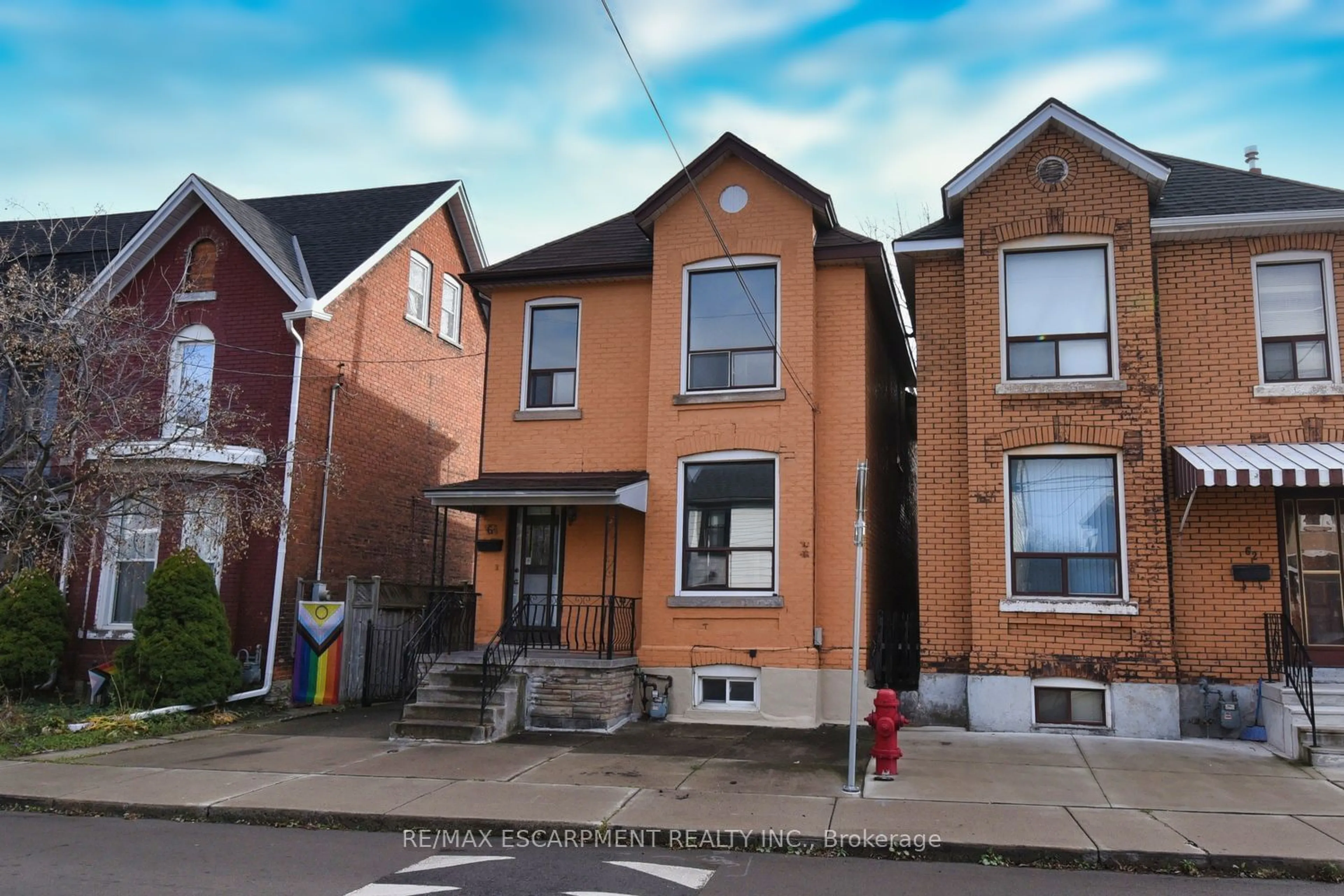 Frontside or backside of a home, the street view for 64 Crooks St, Hamilton Ontario L8R 2Z6