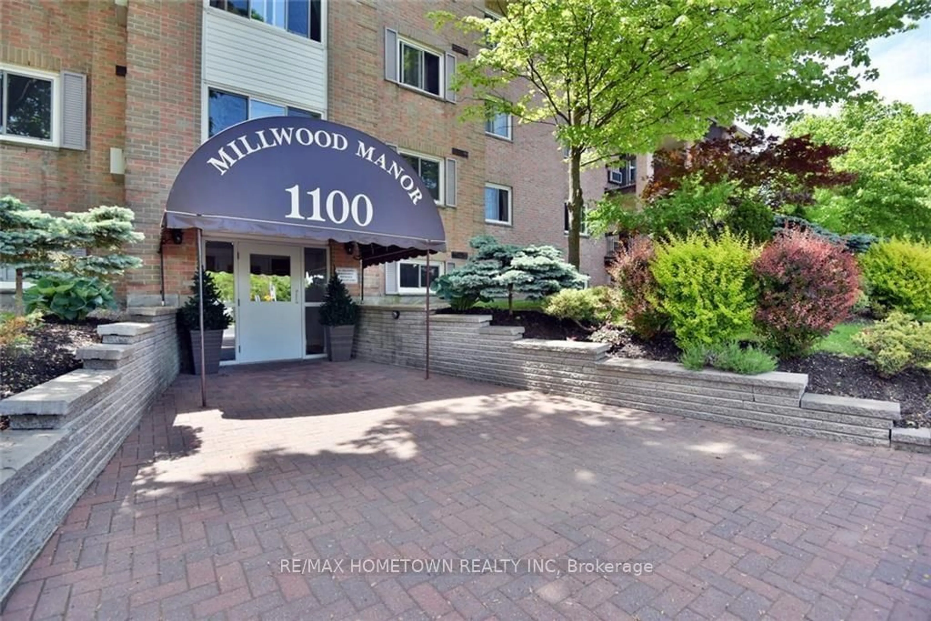 A pic from exterior of the house or condo, the street view for 1100 Millwood Ave #307, Brockville Ontario K6V 6Z3