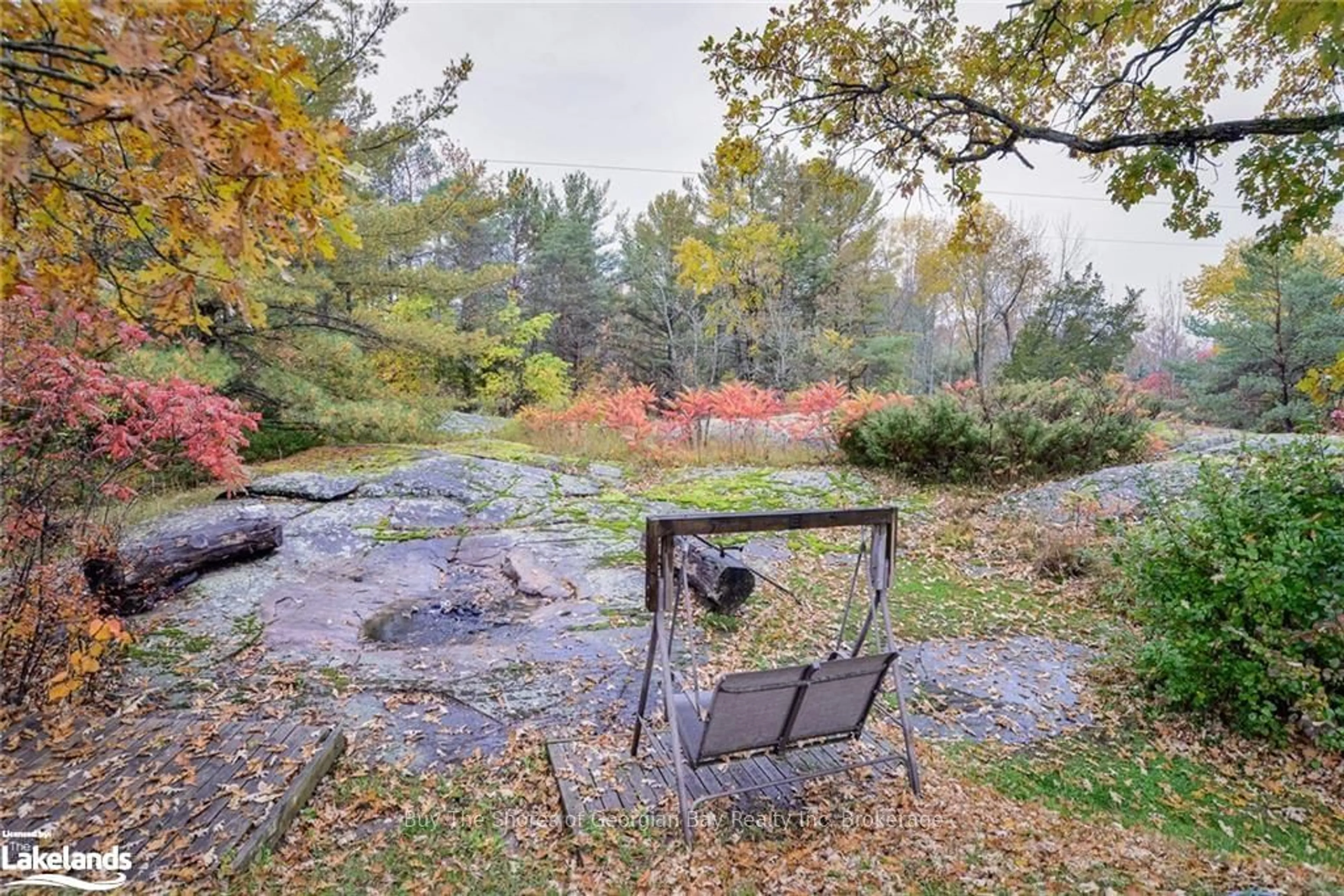 Patio, the fenced backyard for 659 HONEY HARBOUR Rd, Georgian Bay Ontario L0K 1S0