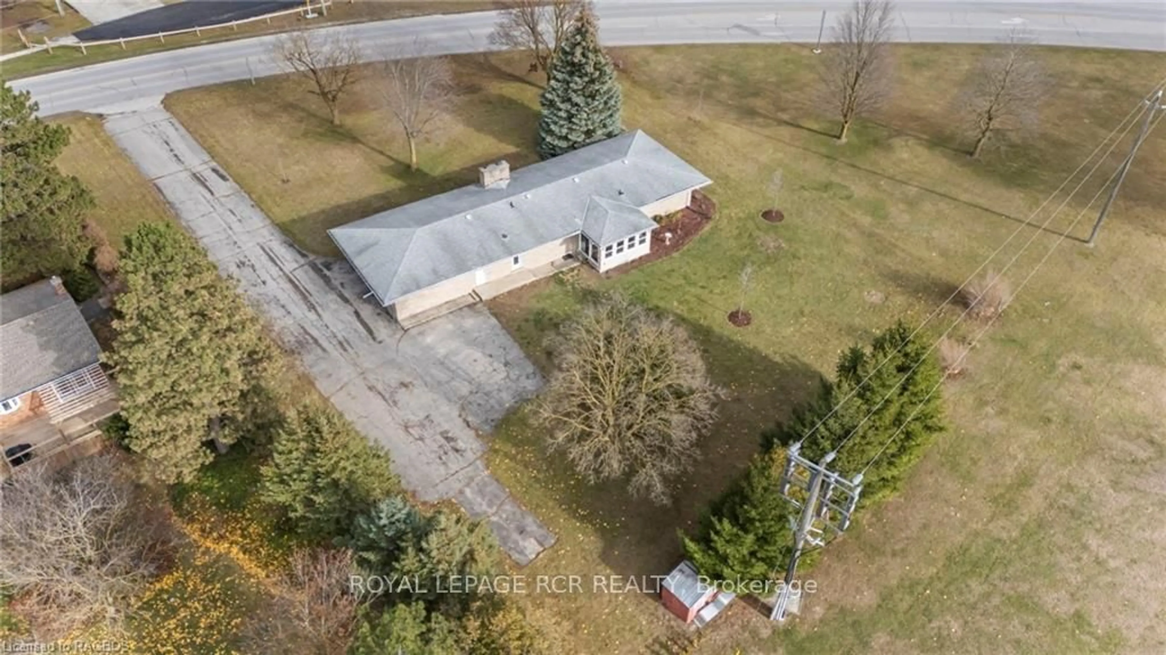 Frontside or backside of a home, the fenced backyard for 315 2ND St, Hanover Ontario N4N 1A4