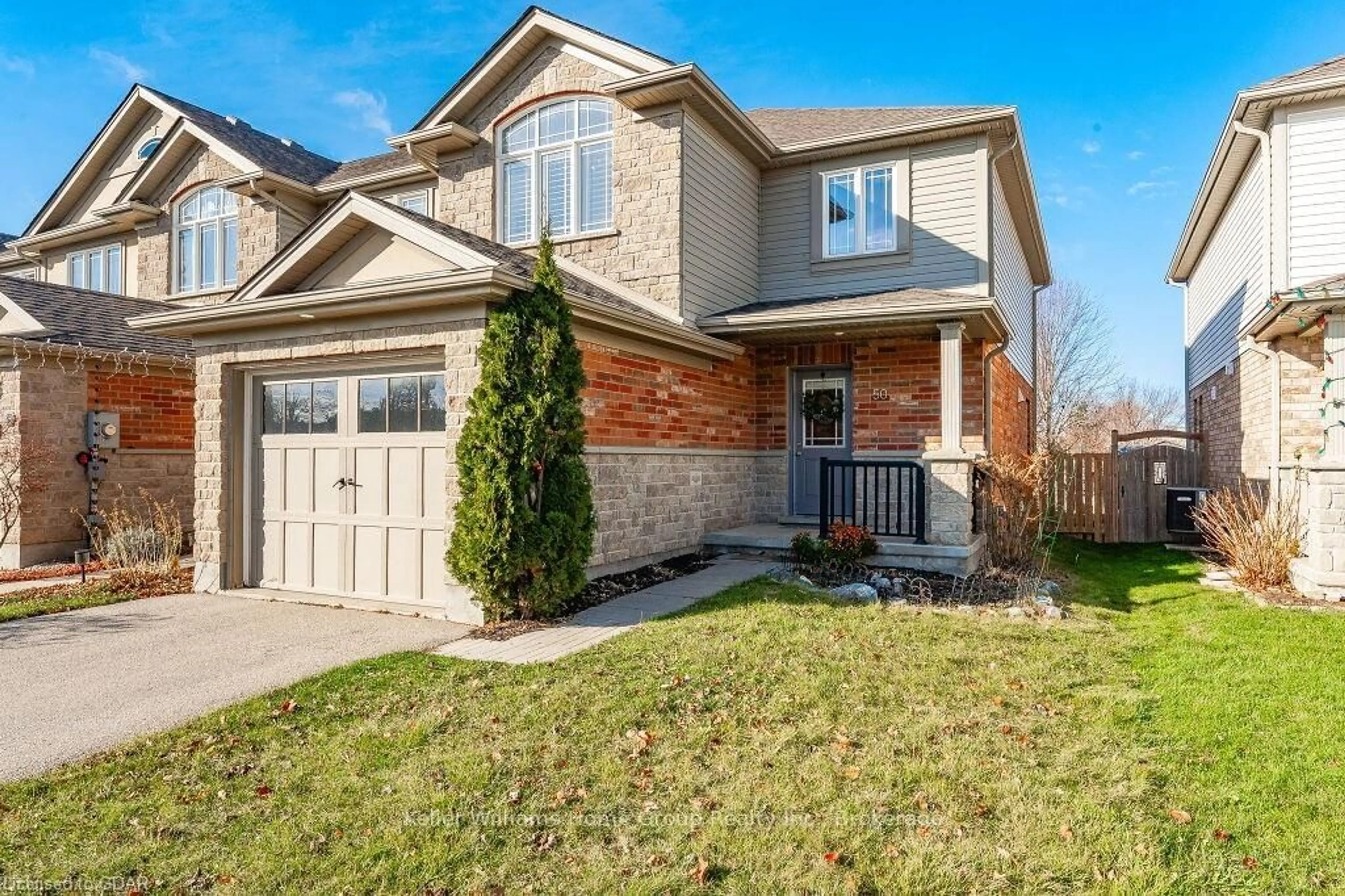 Frontside or backside of a home, the fenced backyard for 50 WILKIE Cres, Guelph Ontario N1L 0C2