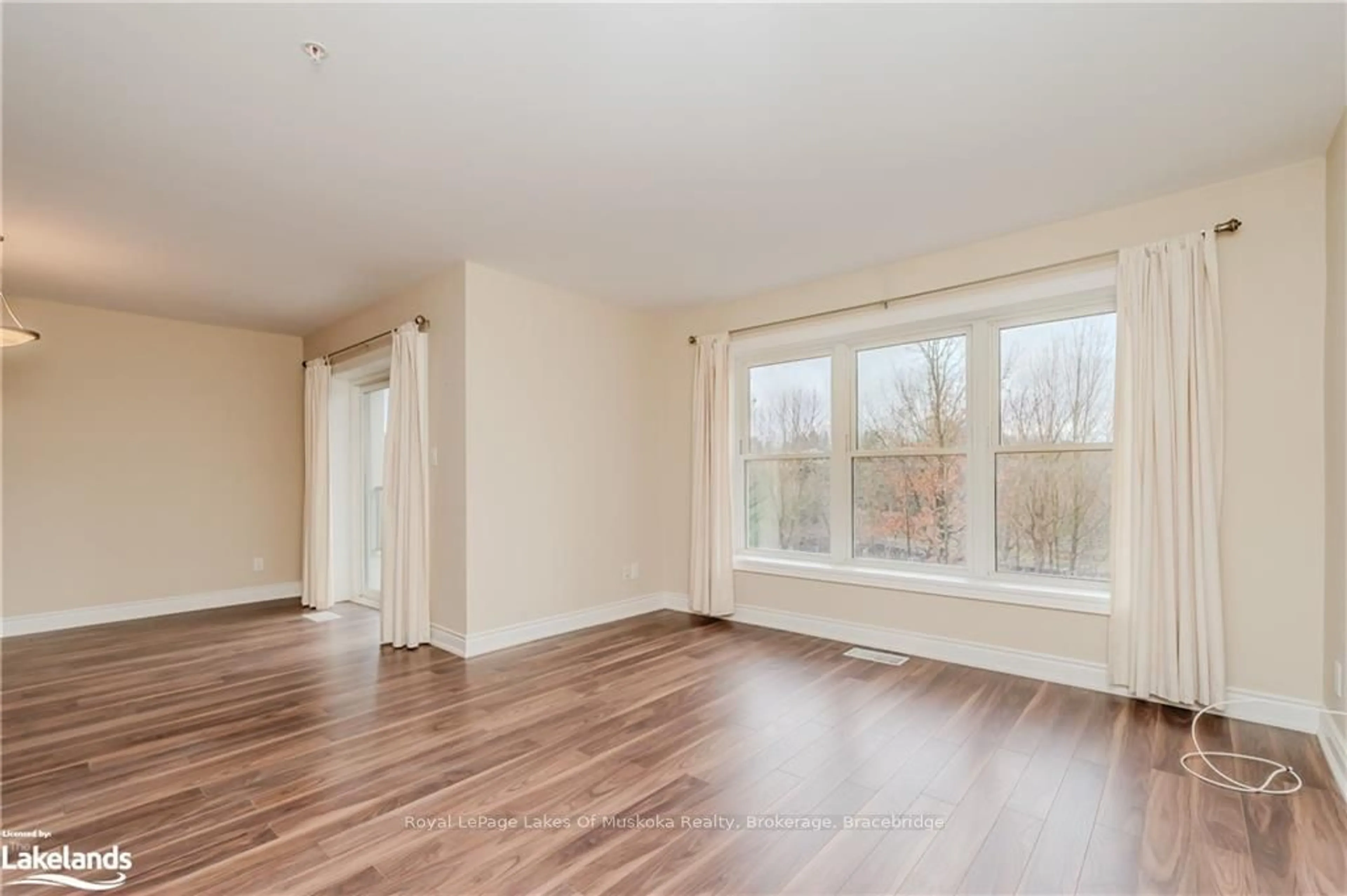 A pic of a room, wood floors for 10B KIMBERLEY Ave #GL5, Bracebridge Ontario P1L 0A6