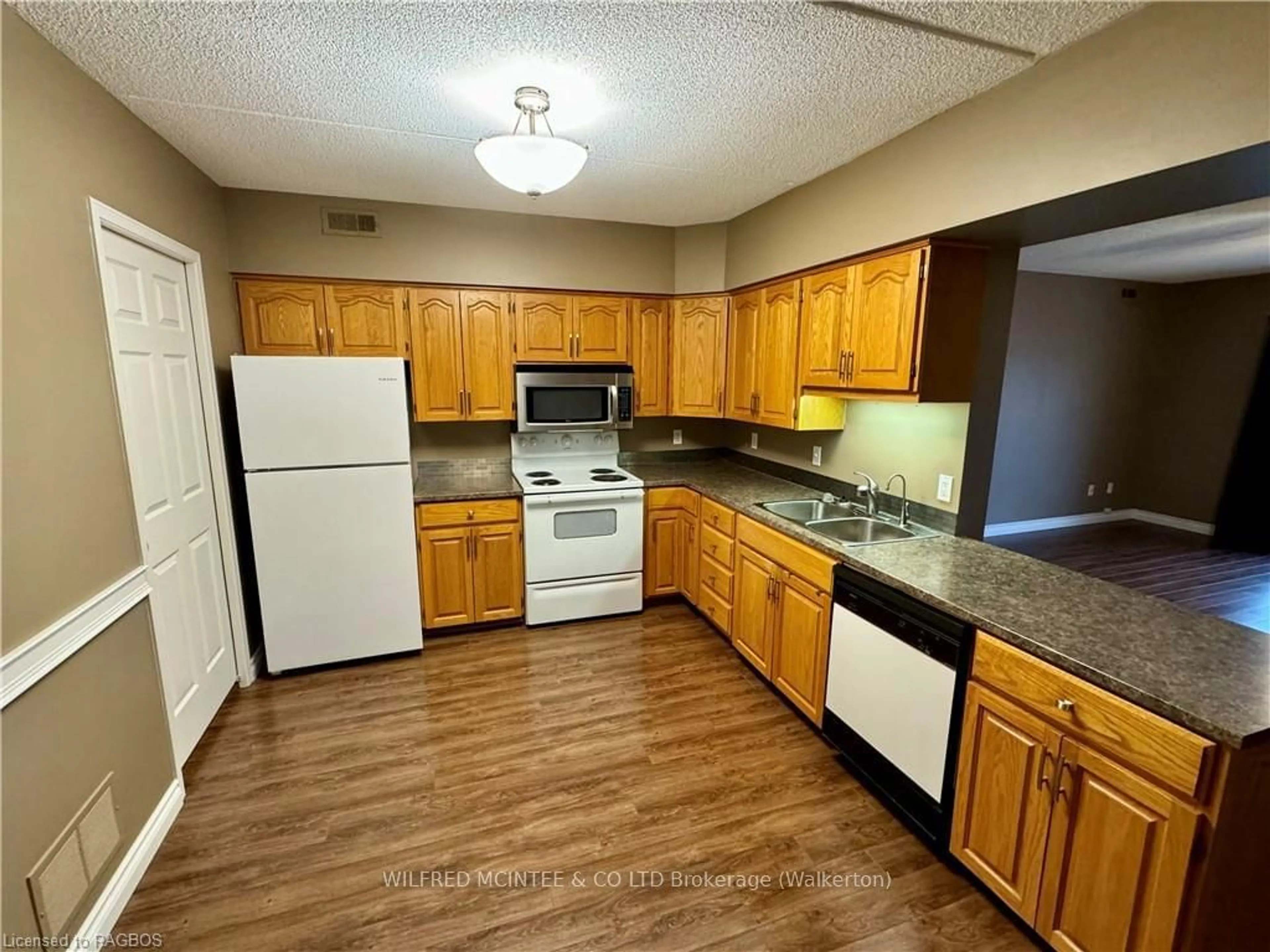 Standard kitchen, wood floors, cottage for 203 MCNABB St #304, Brockton Ontario N0G 2V0