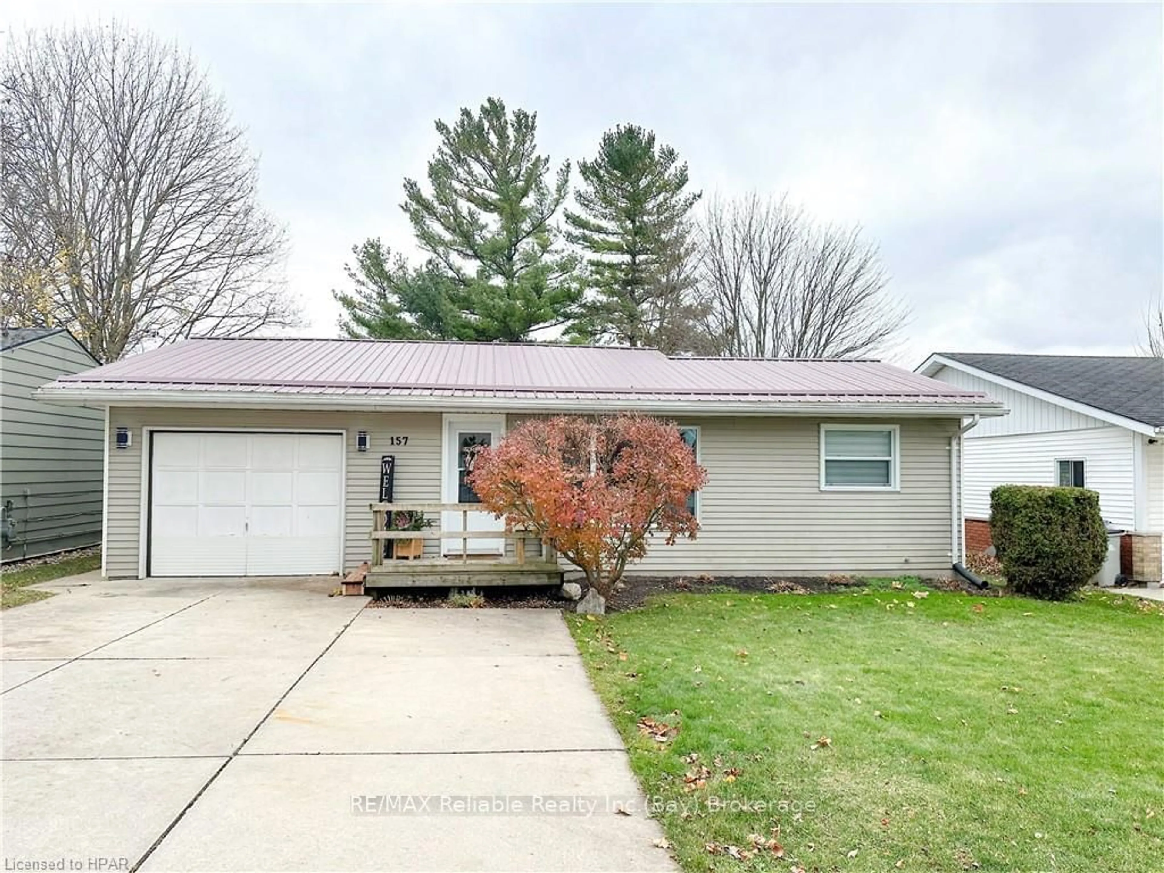 Frontside or backside of a home, the street view for 157 HURON St, South Huron Ontario N0M 1S1