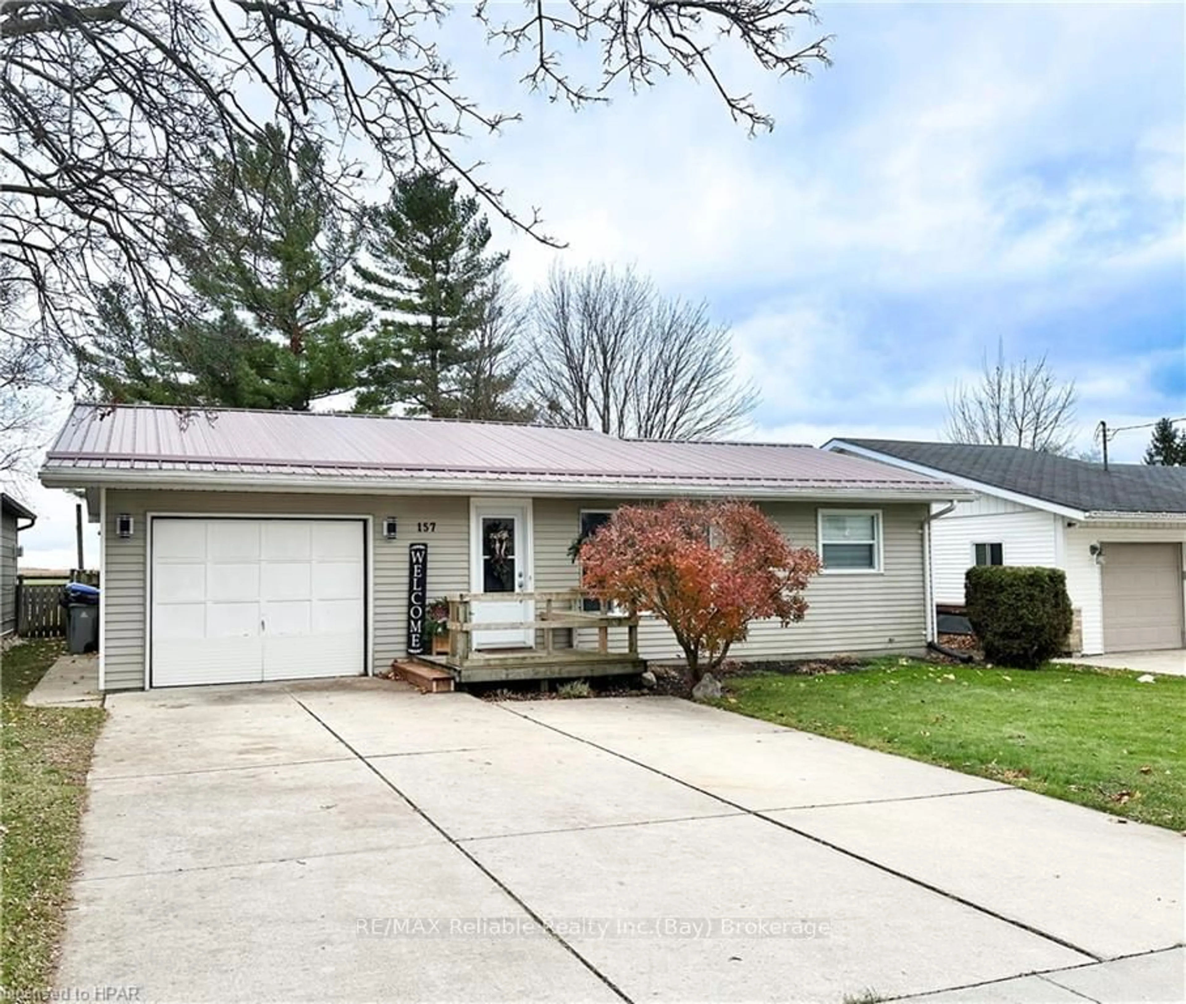 Frontside or backside of a home, the street view for 157 HURON St, South Huron Ontario N0M 1S1