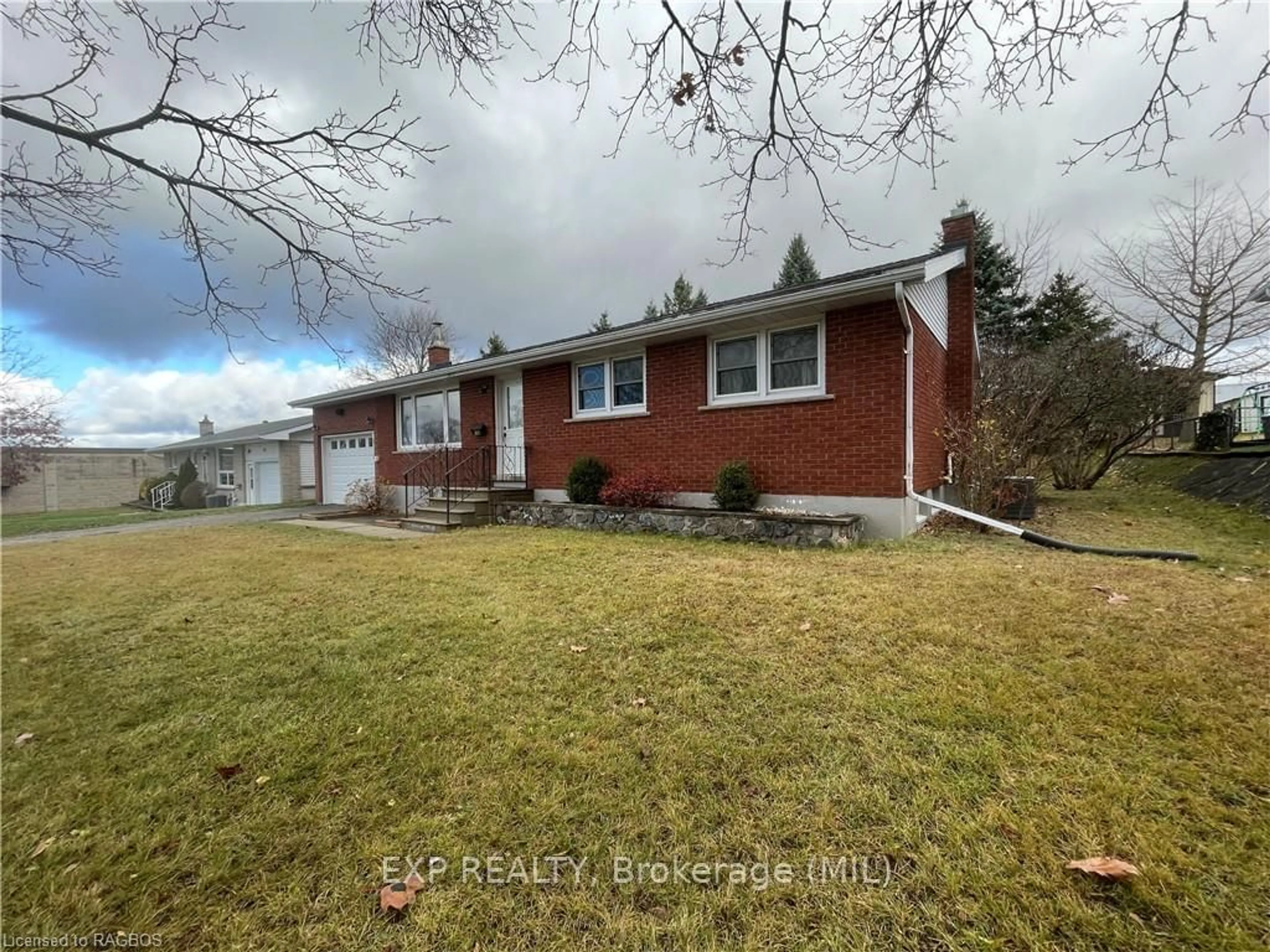 Frontside or backside of a home, the fenced backyard for 159 6TH Ave, Hanover Ontario N4N 2E3
