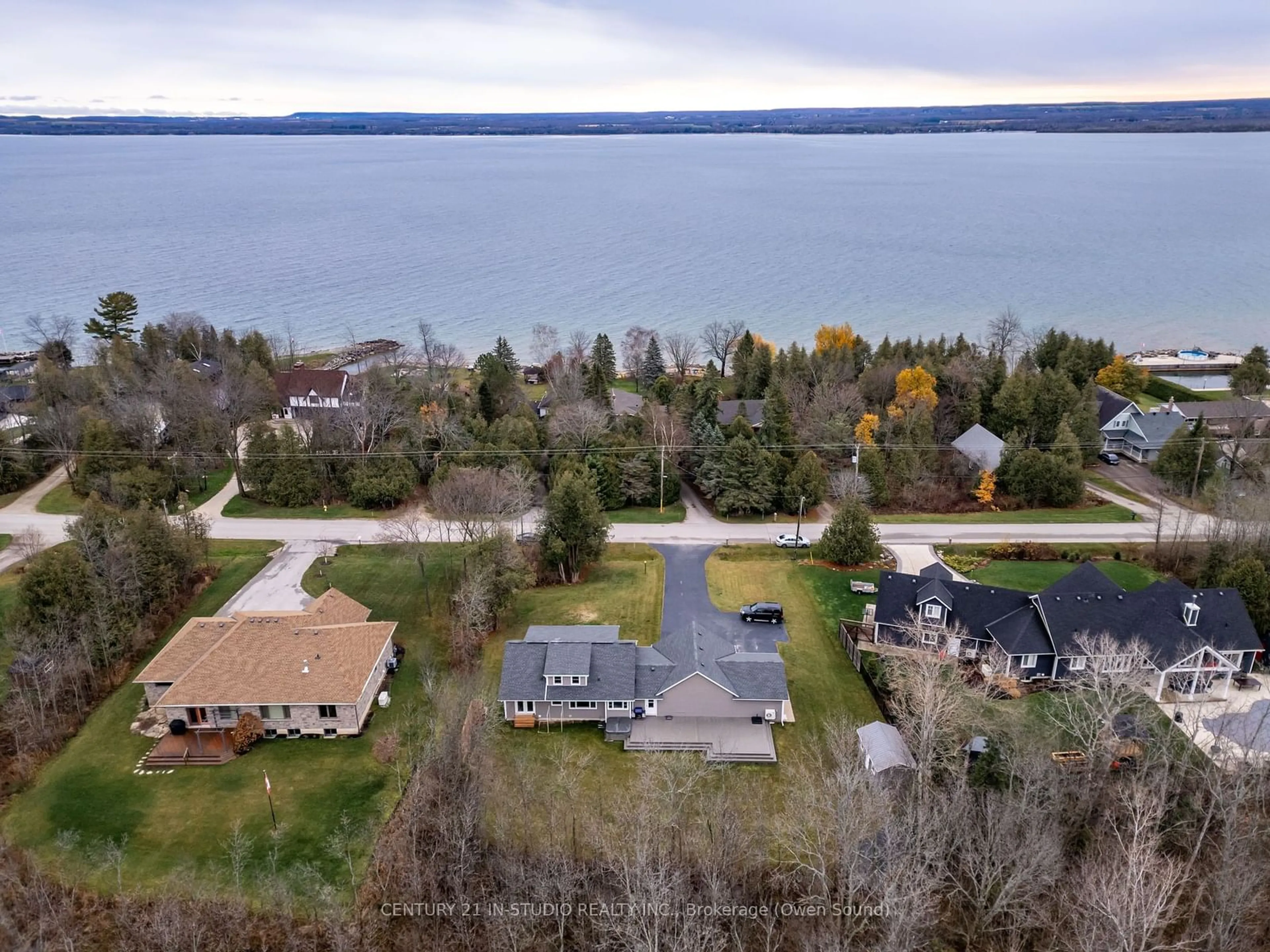 A pic from outside/outdoor area/front of a property/back of a property/a pic from drone, water/lake/river/ocean view for 388 BALMY BEACH Rd, Georgian Bluffs Ontario N4K 5N4