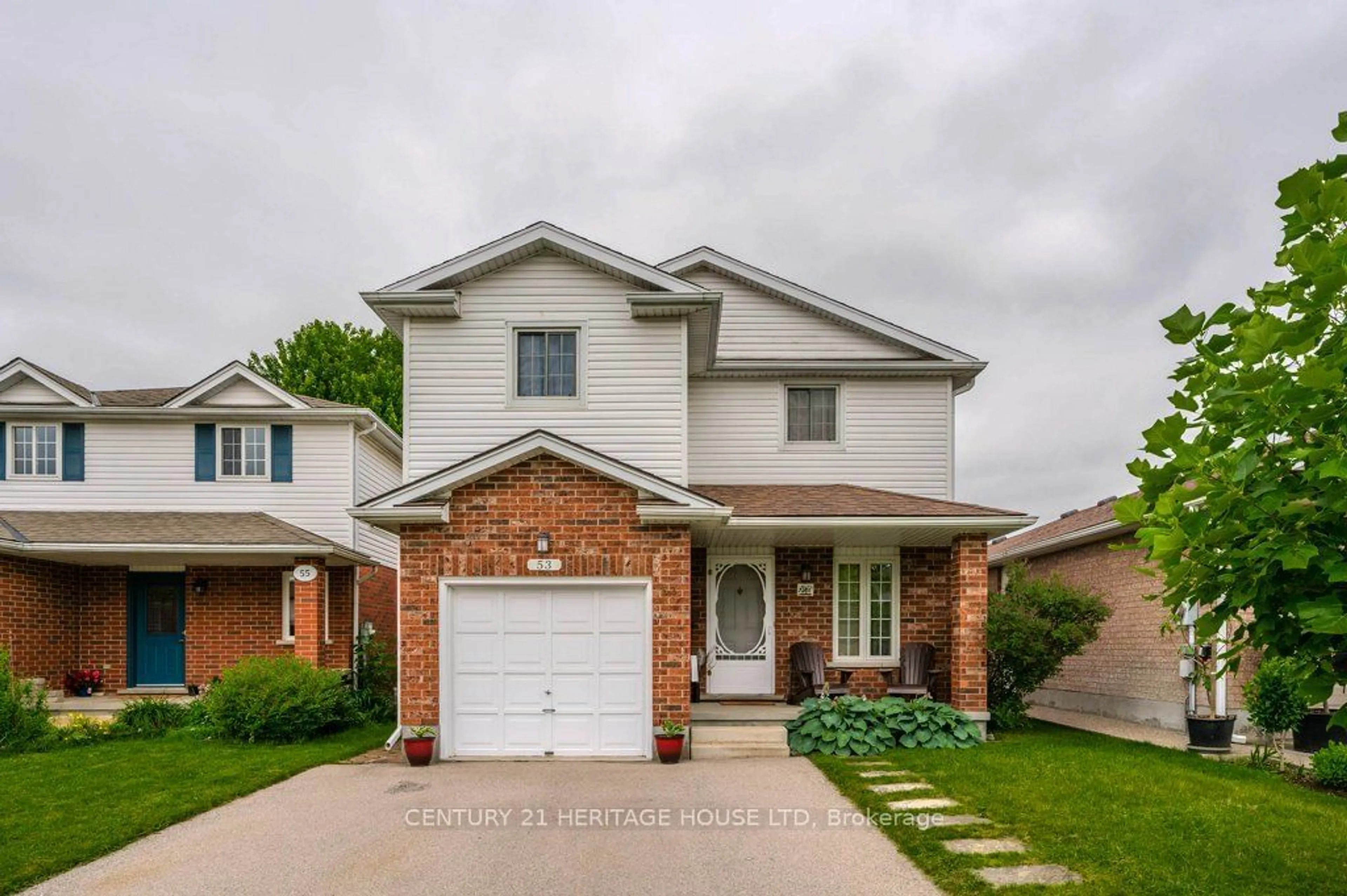 Frontside or backside of a home, the street view for 53 Thompson Dr, Guelph Ontario N1E 7A2