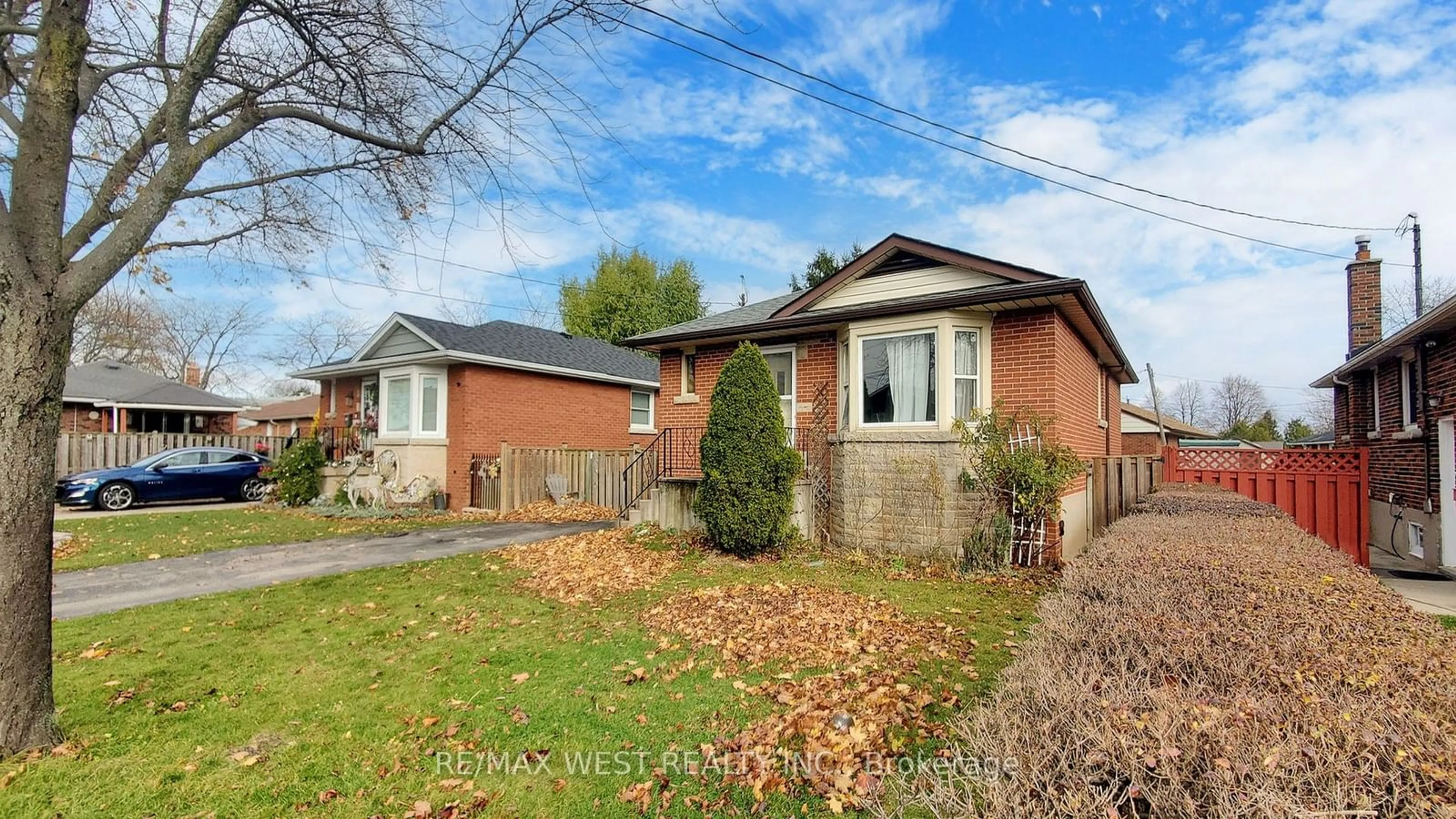 Frontside or backside of a home, the fenced backyard for 15 Darcy Crt, Hamilton Ontario L8V 2B9