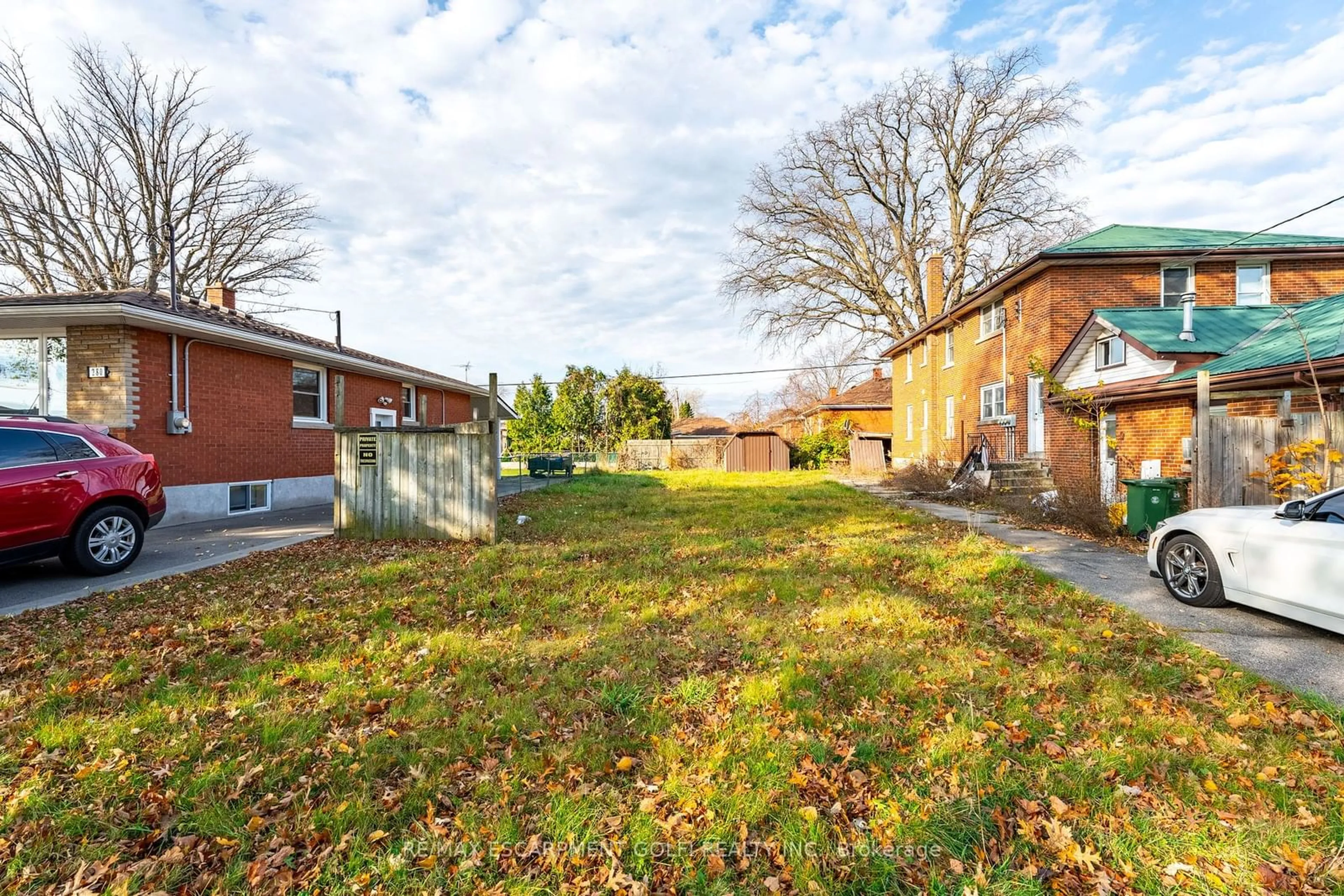 Frontside or backside of a home, the fenced backyard for 270 East 43rd St, Hamilton Ontario L8T 3E1