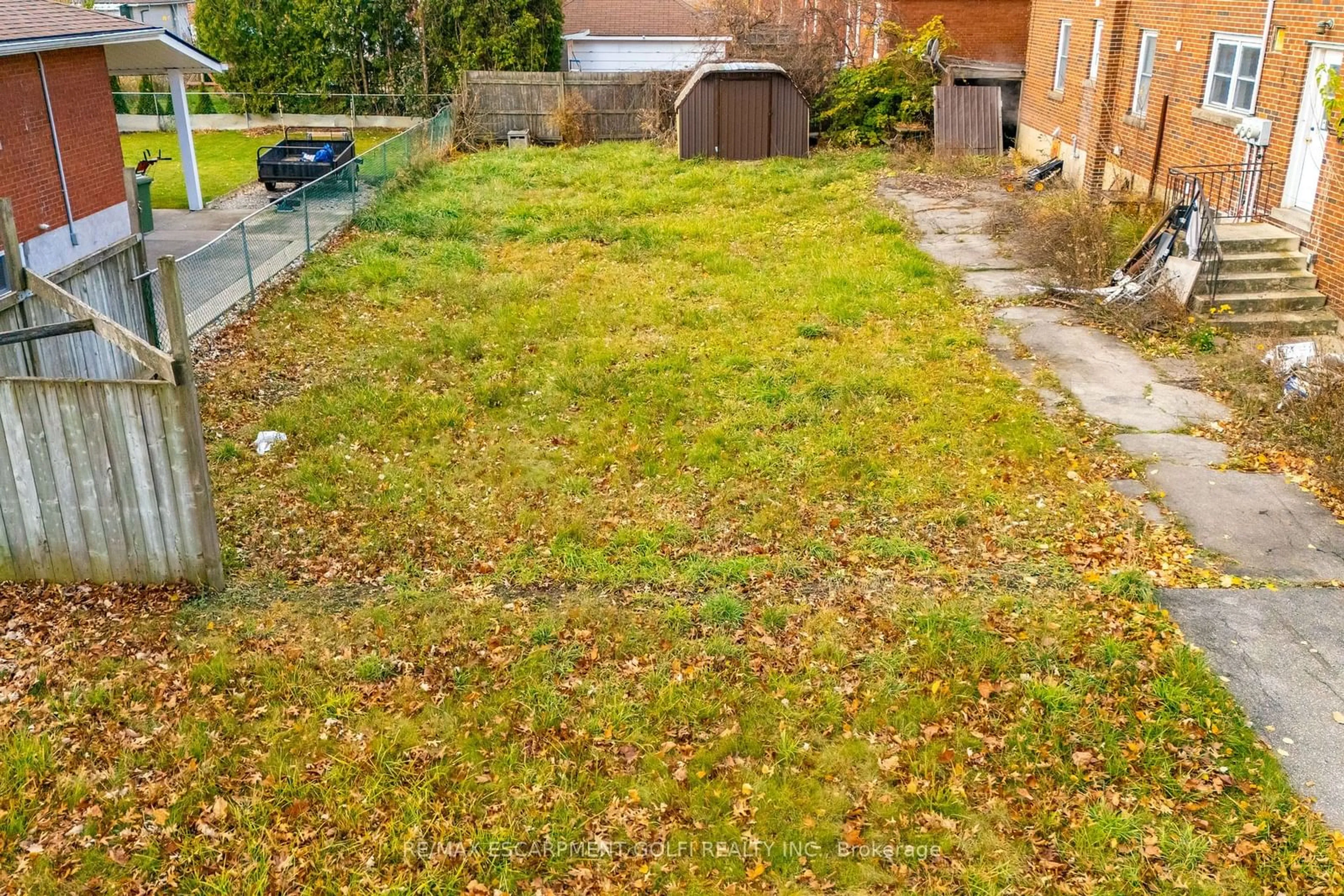 Patio, the fenced backyard for 270 East 43rd St, Hamilton Ontario L8T 3E1