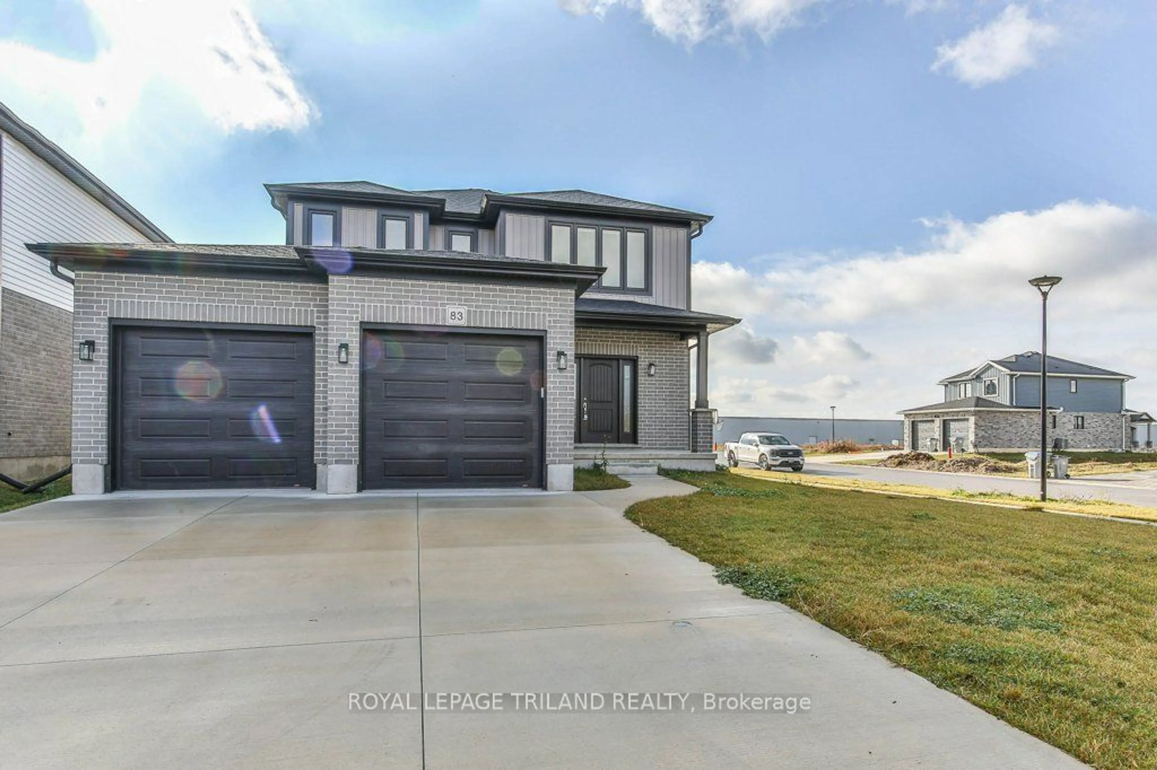 Frontside or backside of a home, the street view for 83 GREENE St, South Huron Ontario N0M 1S2