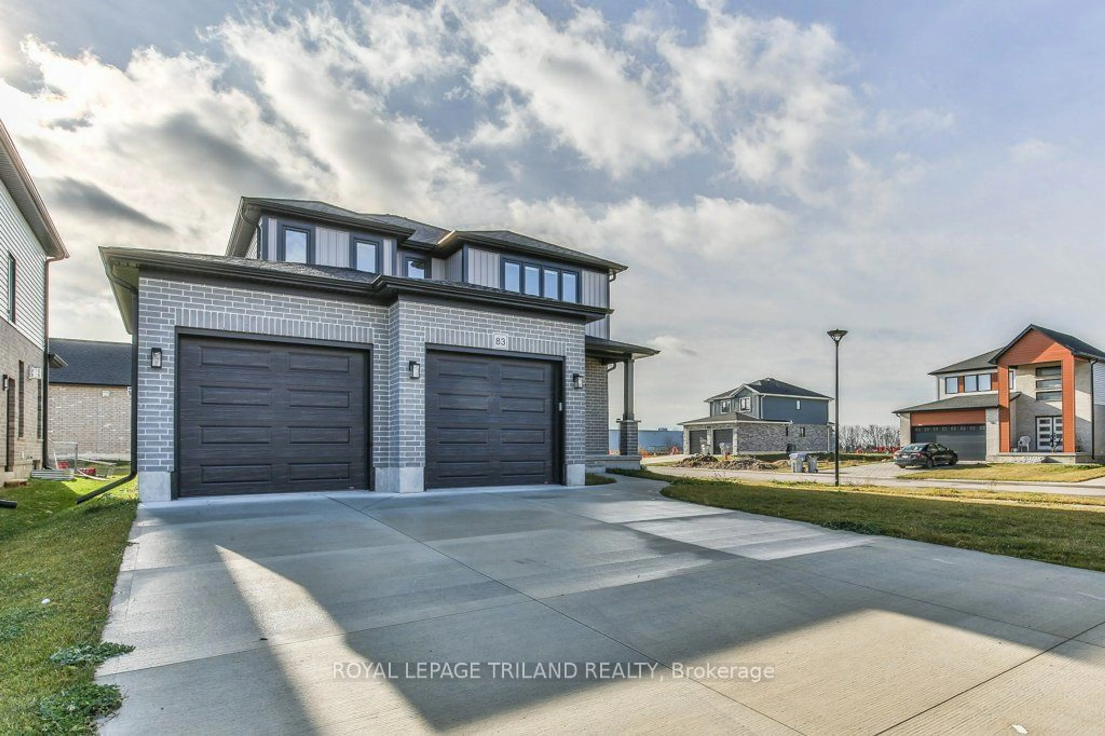 Frontside or backside of a home, the street view for 83 GREENE St, South Huron Ontario N0M 1S2