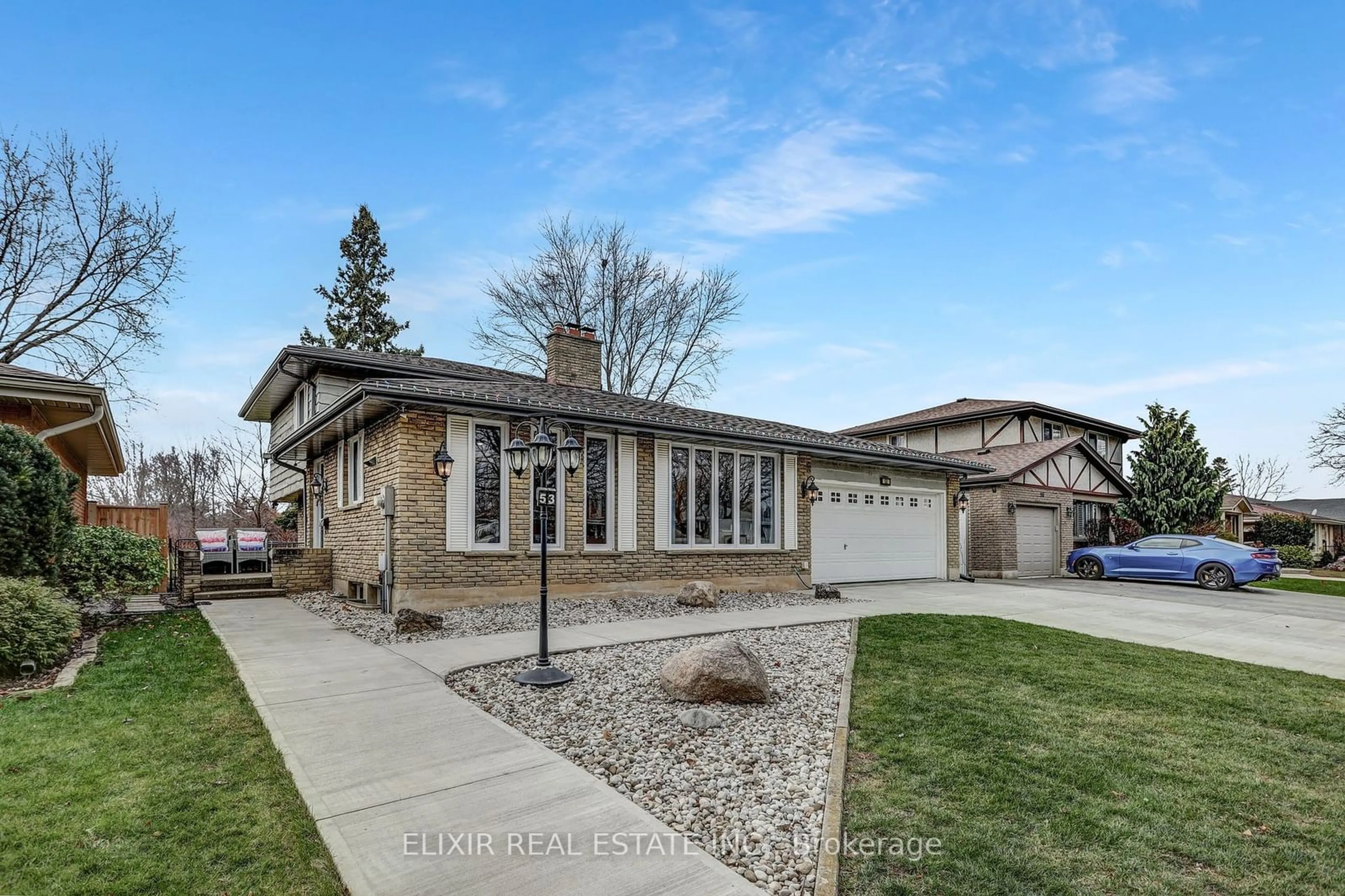 Frontside or backside of a home, the street view for 53 Winding Way, Brantford Ontario N3R 3S4