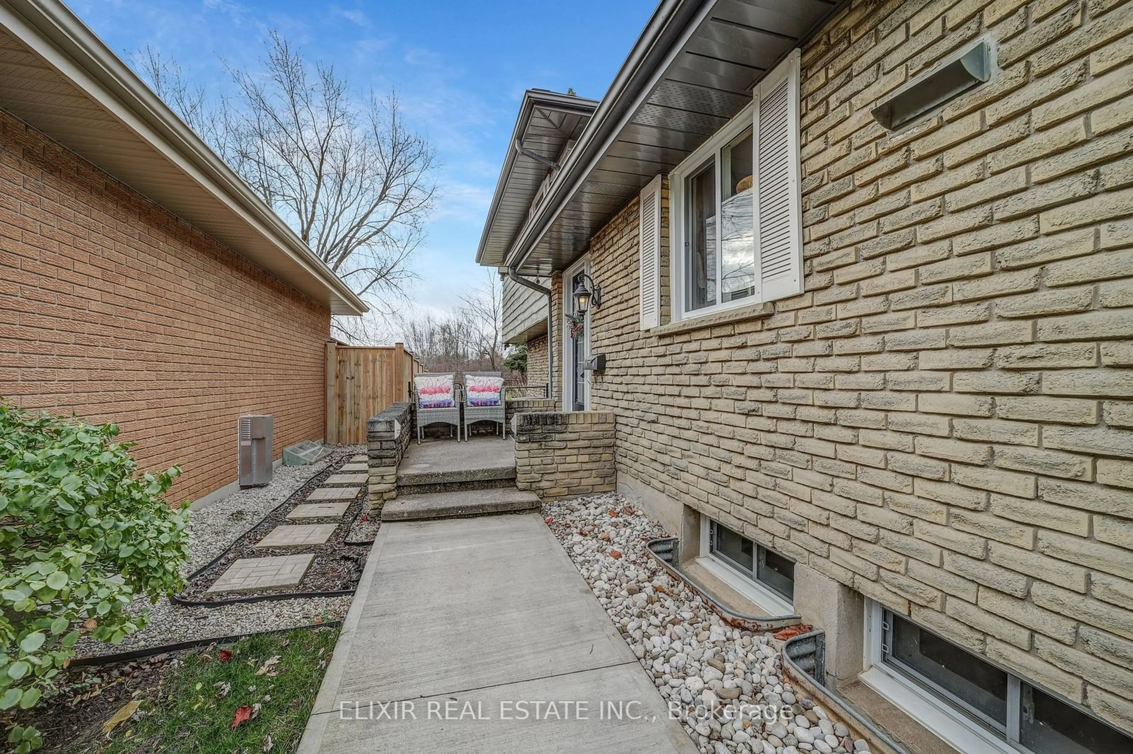 A pic from exterior of the house or condo, the fenced backyard for 53 Winding Way, Brantford Ontario N3R 3S4