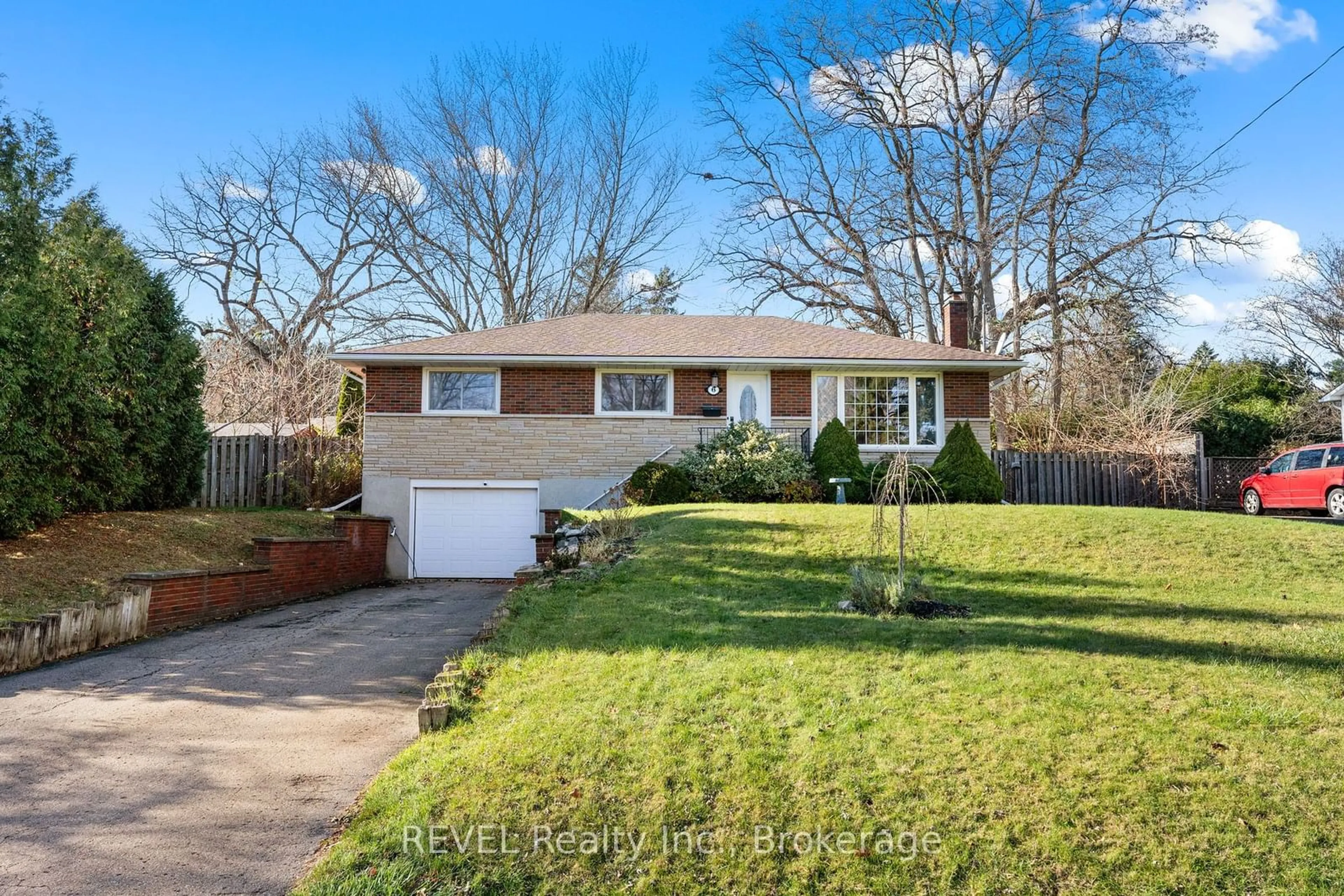 Frontside or backside of a home, the fenced backyard for 6 Stella St, Pelham Ontario L0S 1E0