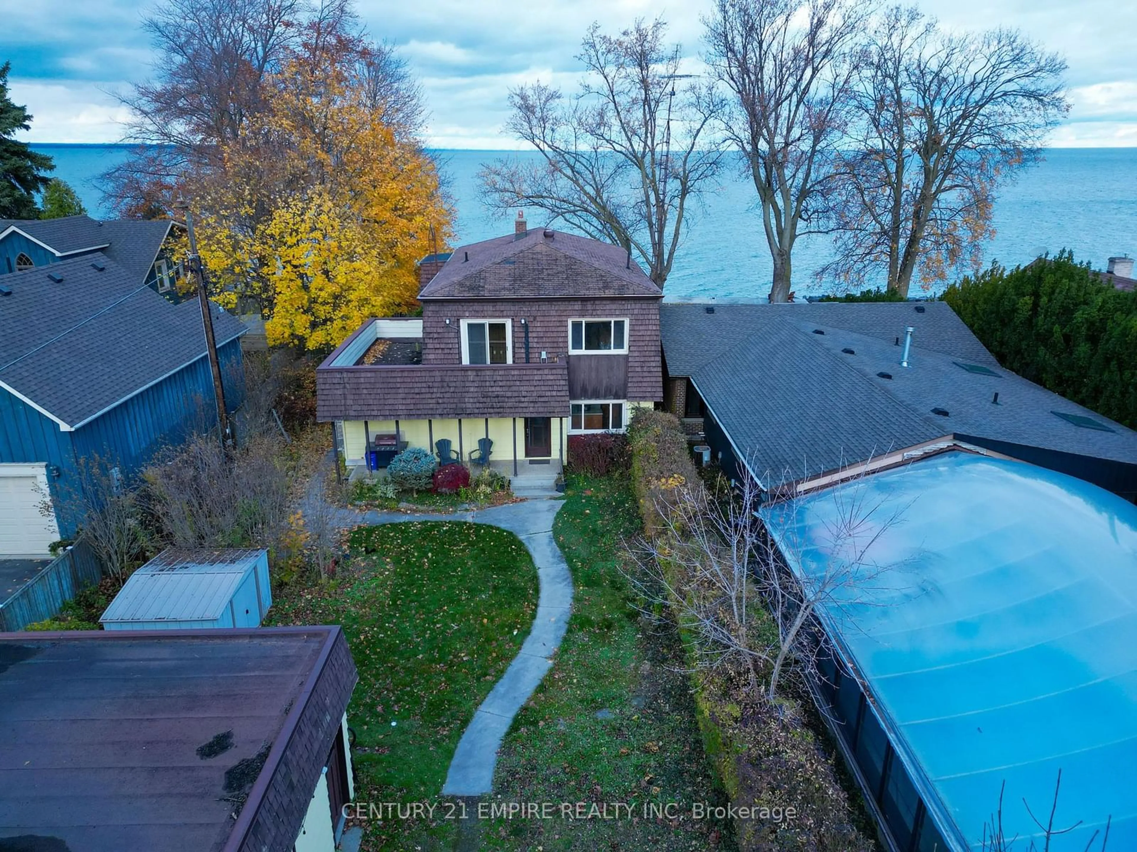 Frontside or backside of a home, the fenced backyard for 37 Church St, Hamilton Ontario L8E 2X7