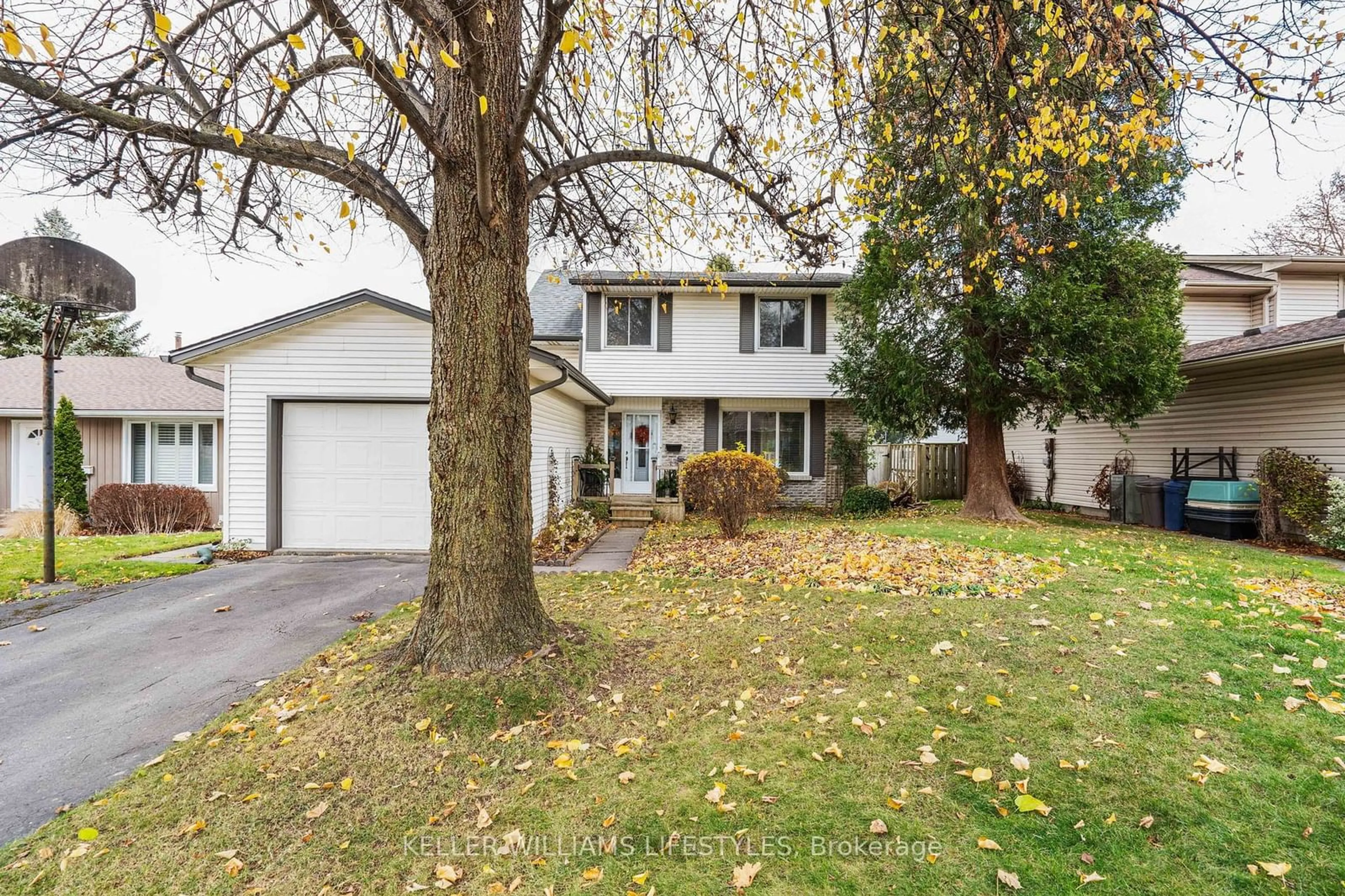 Frontside or backside of a home, the fenced backyard for 1560 Aldersbrook Rd, London Ontario N6G 2Z3