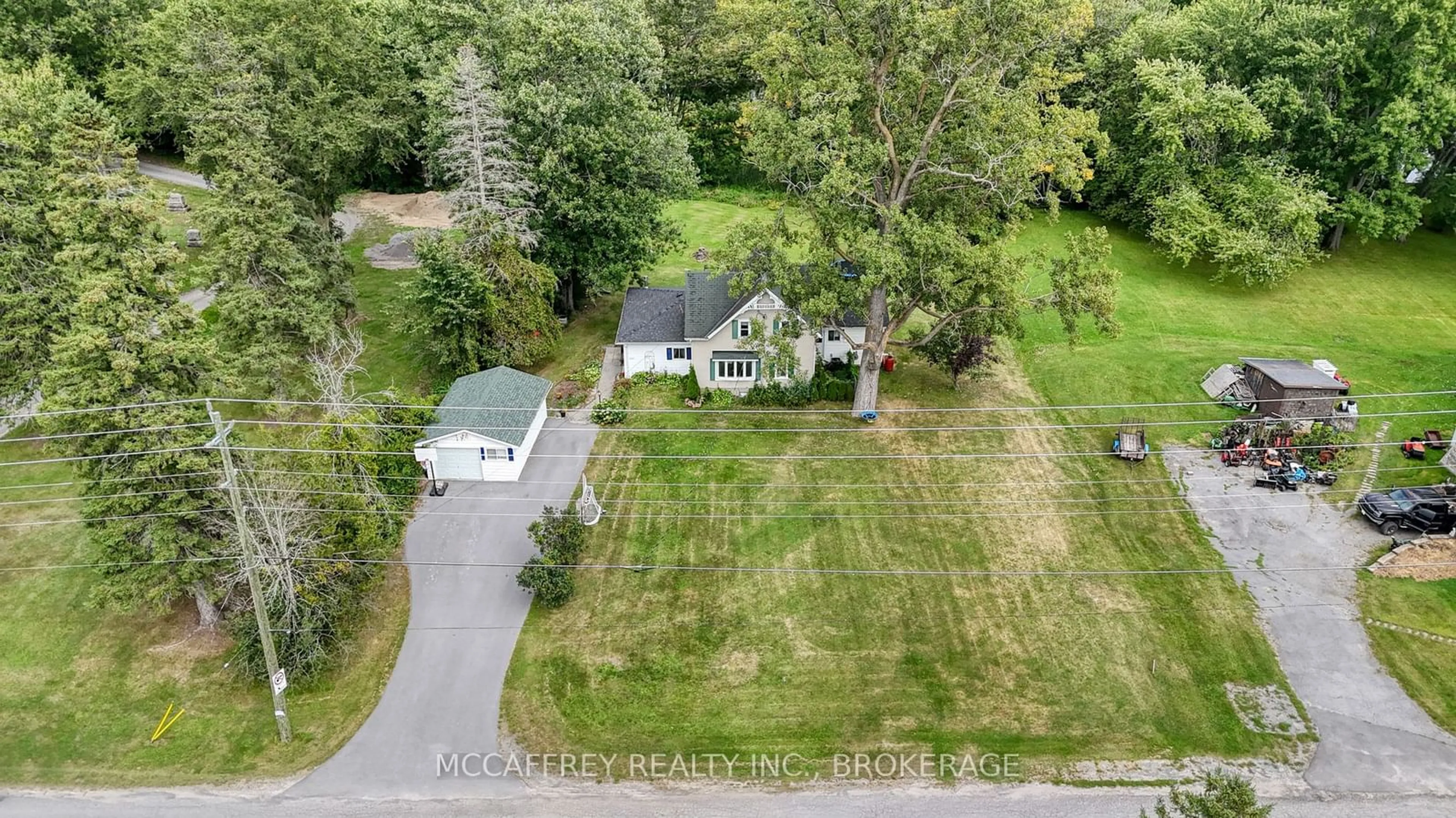 Frontside or backside of a home, the fenced backyard for 324 CHURCH St, Greater Napanee Ontario K7R 3P1