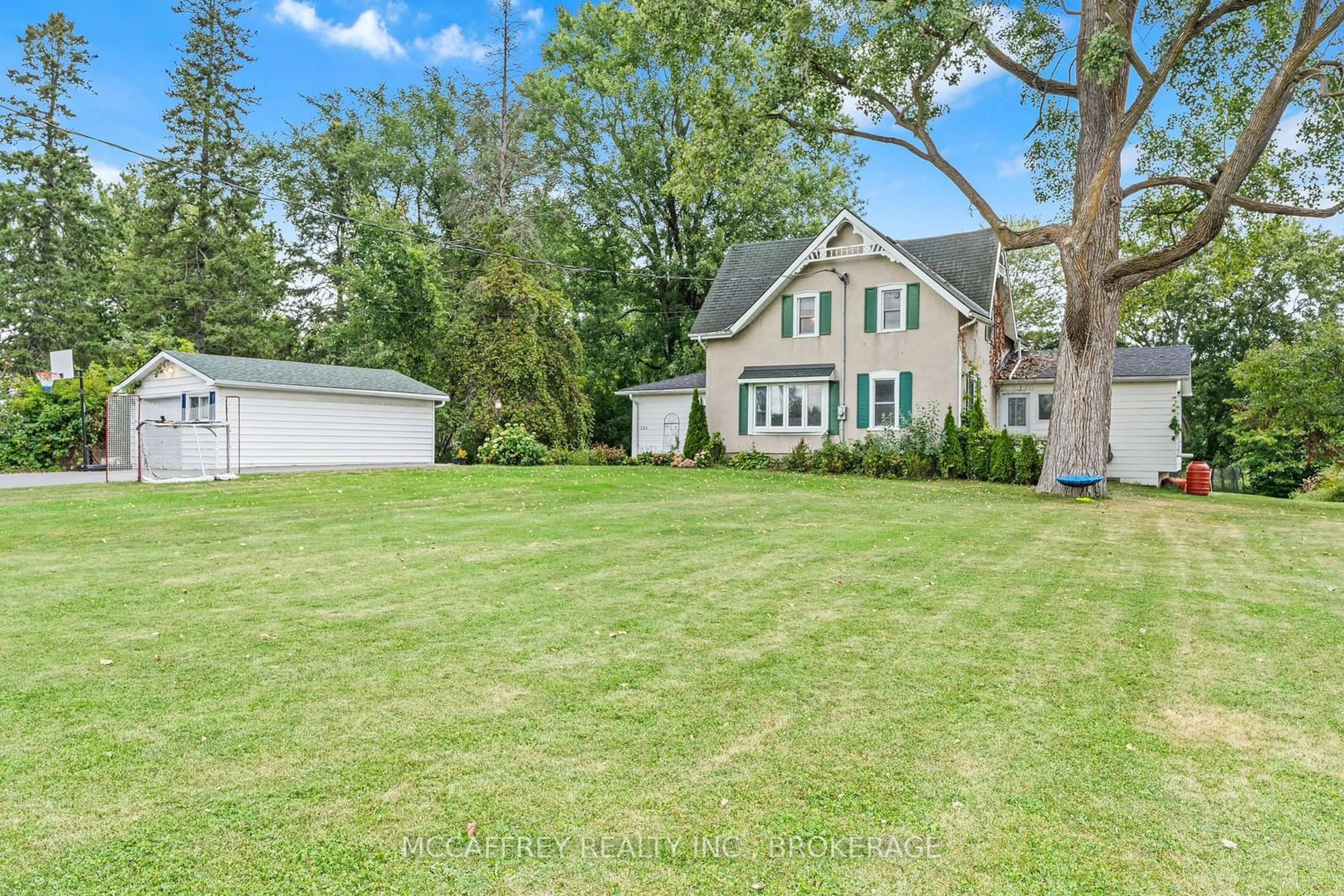 Frontside or backside of a home, the fenced backyard for 324 CHURCH St, Greater Napanee Ontario K7R 3P1