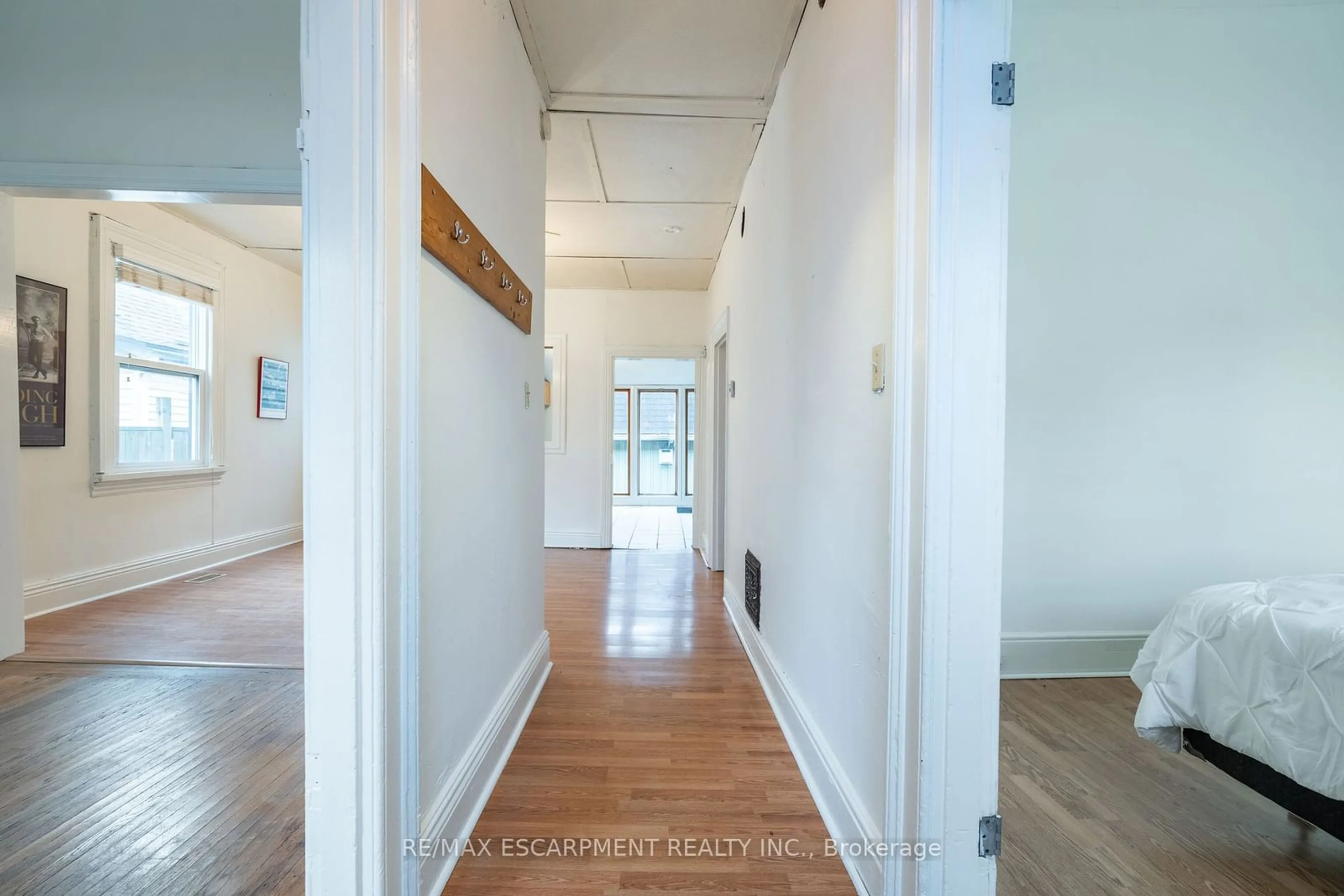 Indoor foyer, wood floors for 49 Jones St, Hamilton Ontario L8R 1X9