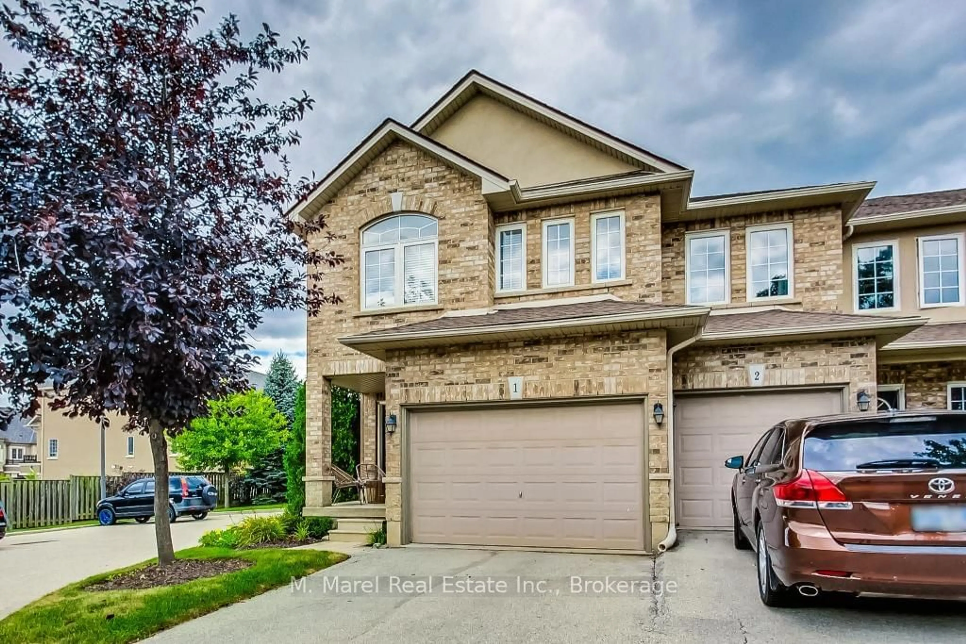 Home with brick exterior material for 39 Panabaker Dr #1, Hamilton Ontario L9G 0A2