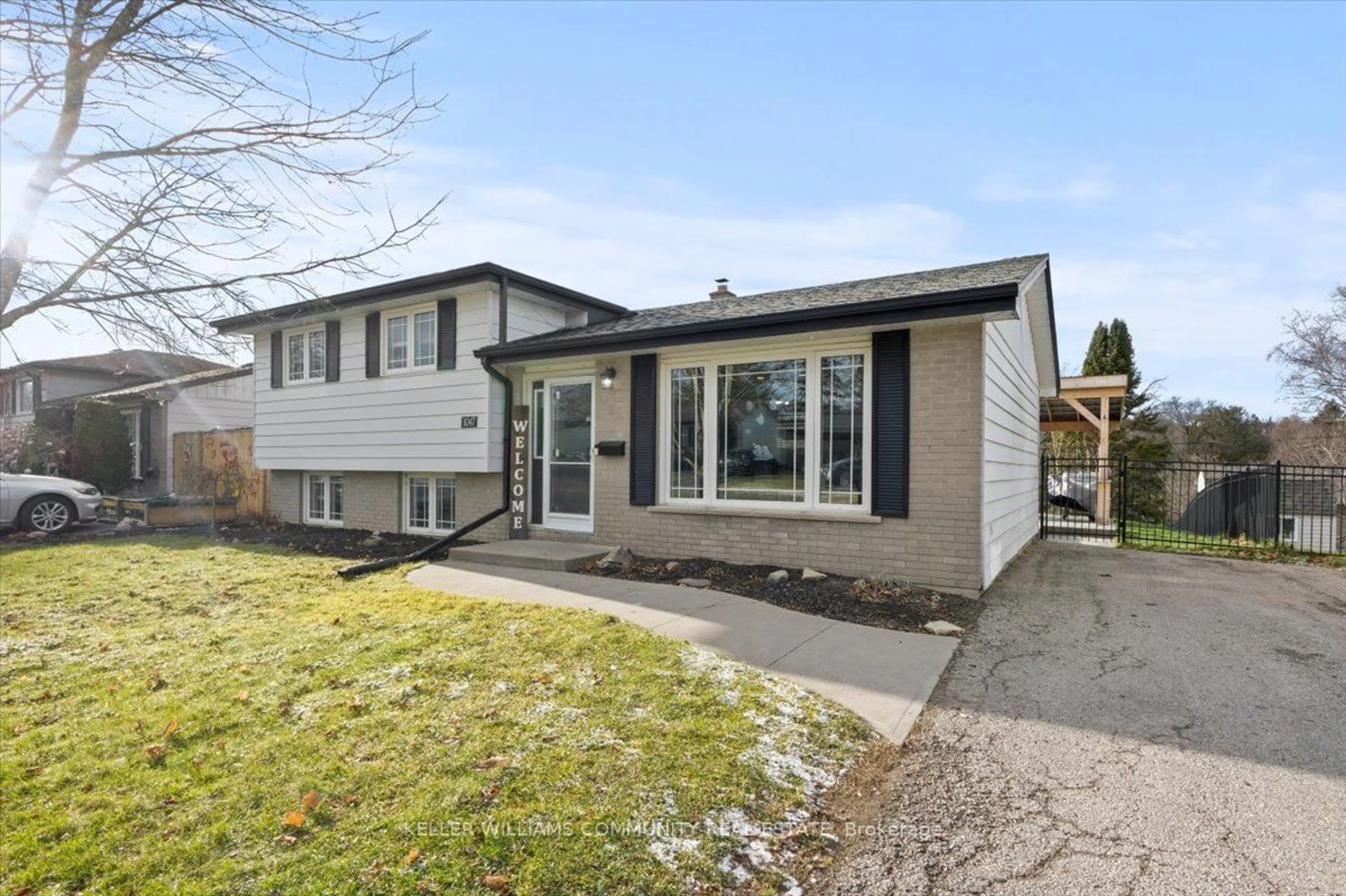 Frontside or backside of a home, the fenced backyard for 1047 St. Paul's St, Peterborough Ontario K9H 6J7