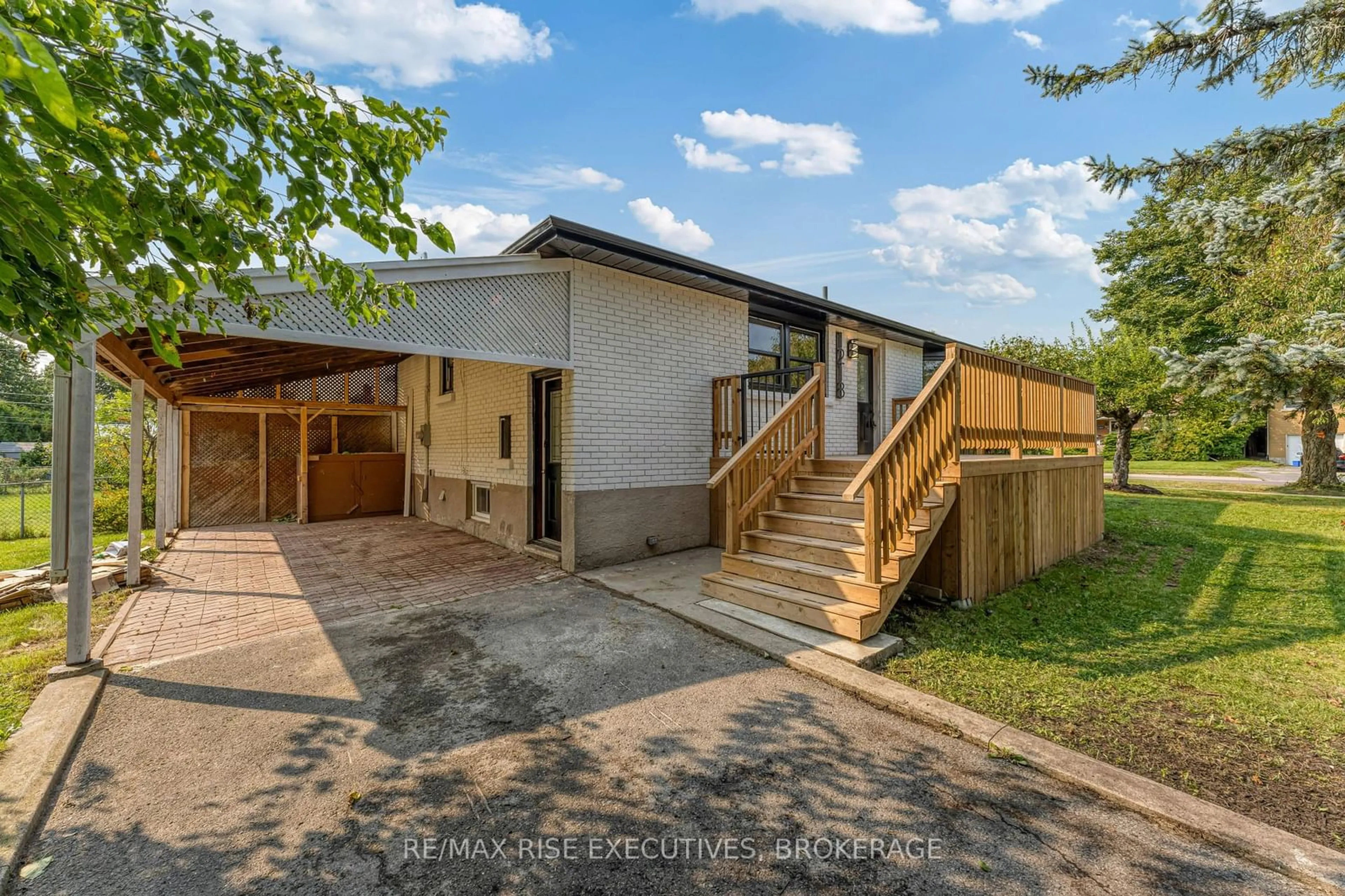 Frontside or backside of a home, the fenced backyard for 1218 JOHNSON St, Kingston Ontario K7M 2A3